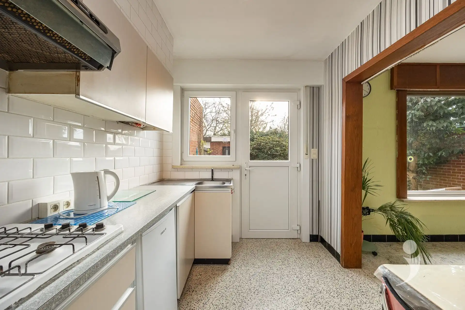 Te renoveren woning met oprit en tuin in Herent foto 8