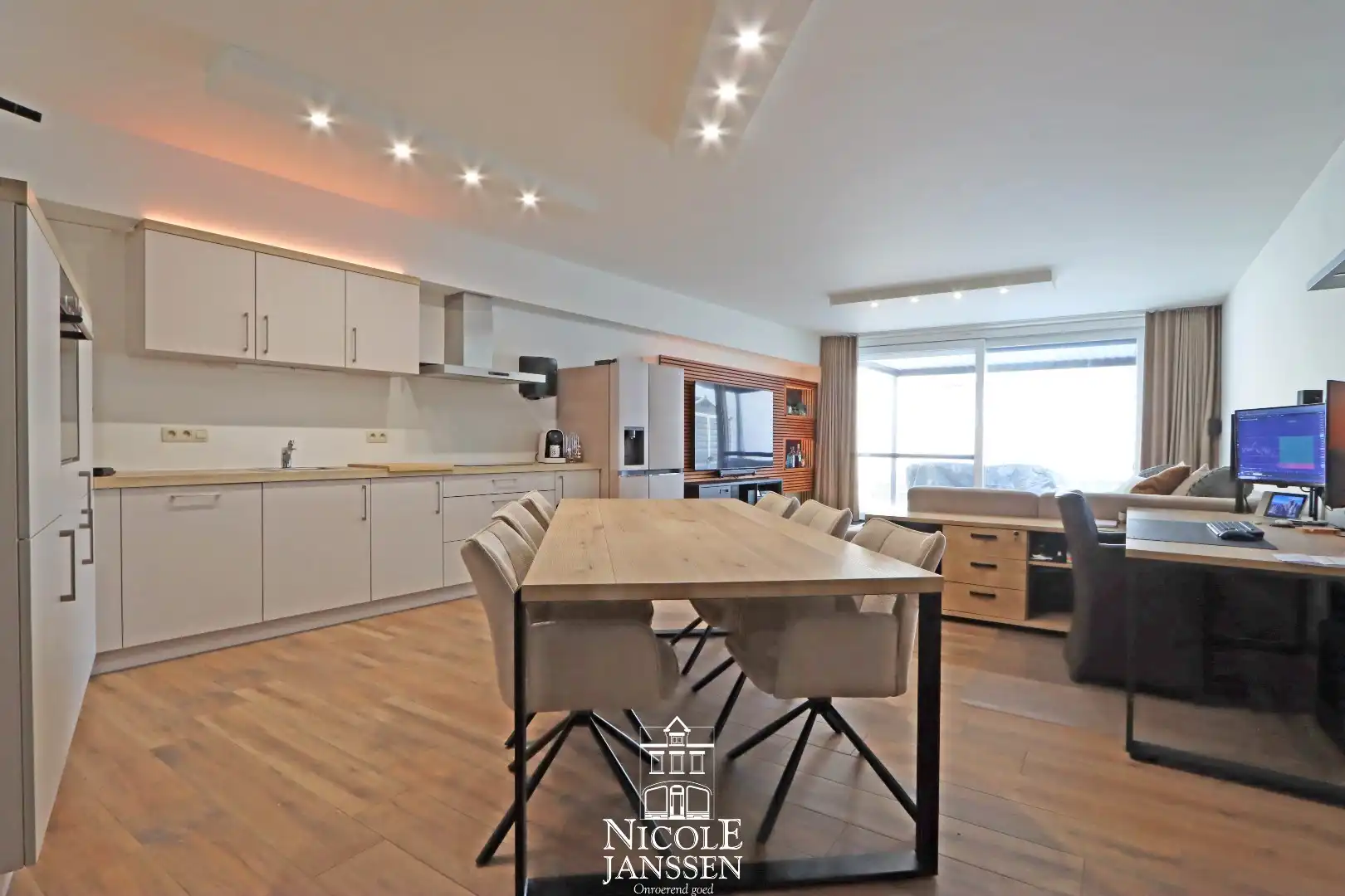 Mooi, gelijkvloers appartement met terras en tuin foto 5