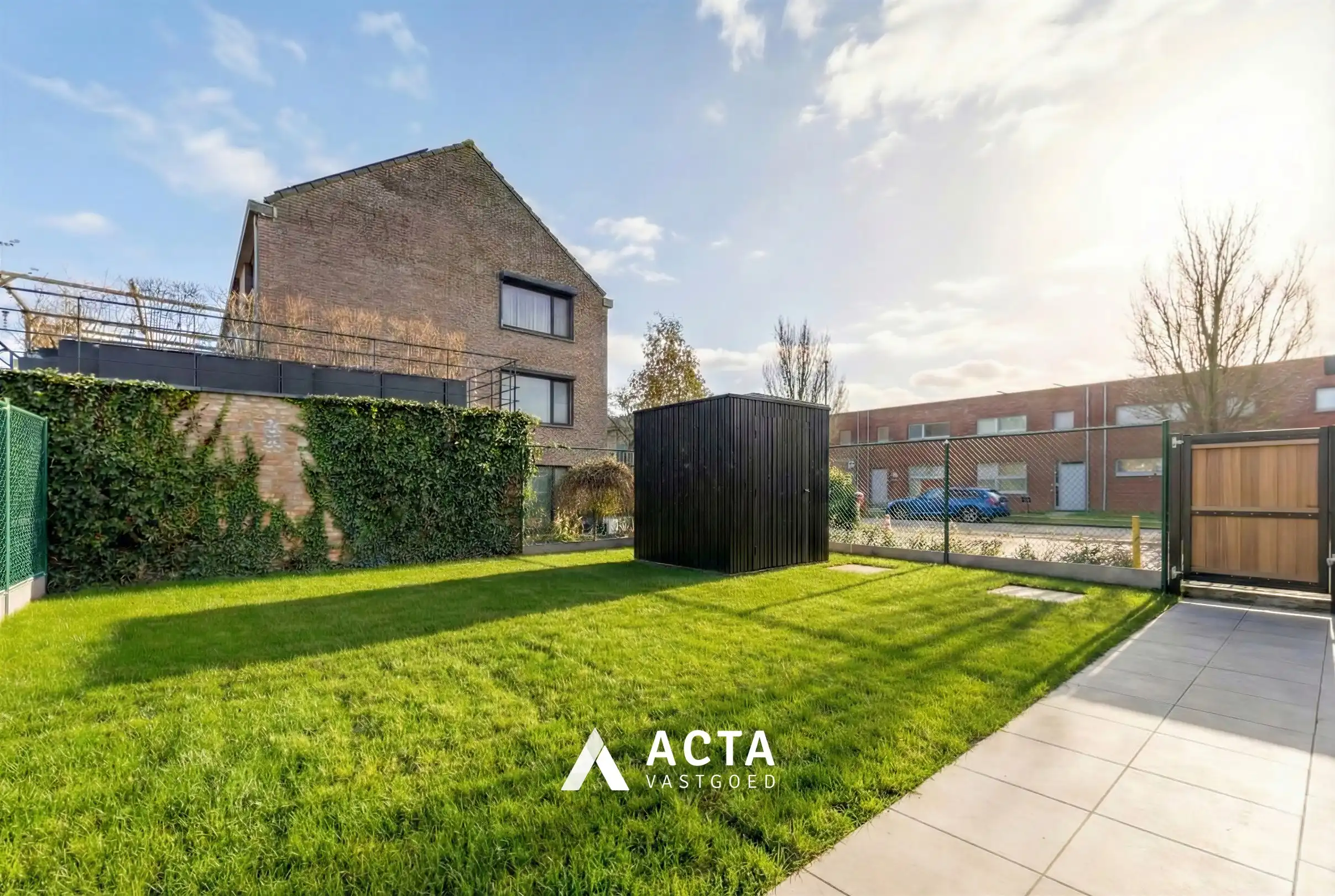 Nieuwbouwwoning met drie slaapkamers en tuin in hartje Mariakerke! foto 2