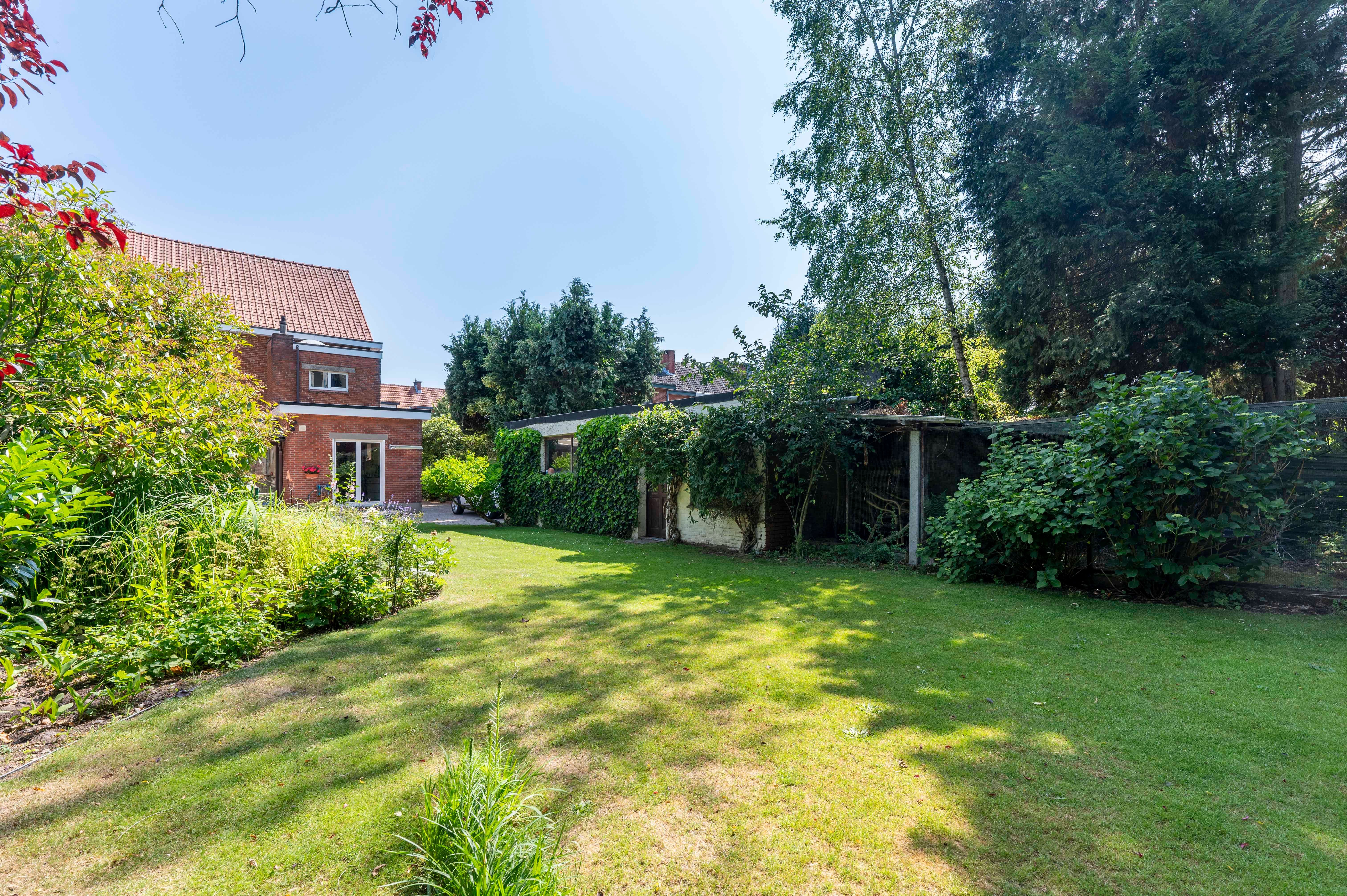 Gezinswoning met grote tuin in kindvriendelijke wijk Driehoek te Brasschaat! foto 33