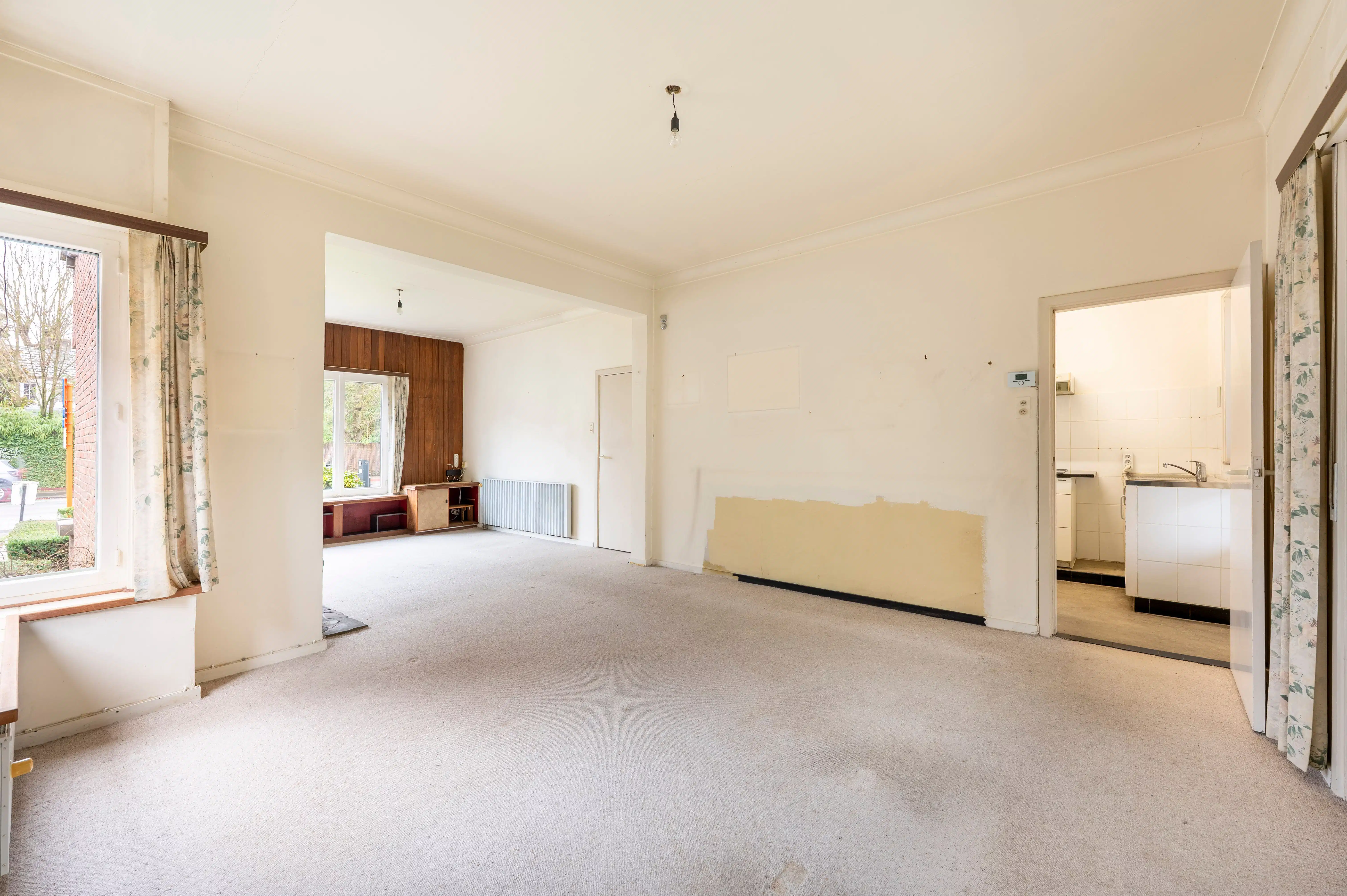 Halfopen bebouwing met veel potentieel, zonnige tuin en garage in Kapellen! foto 7