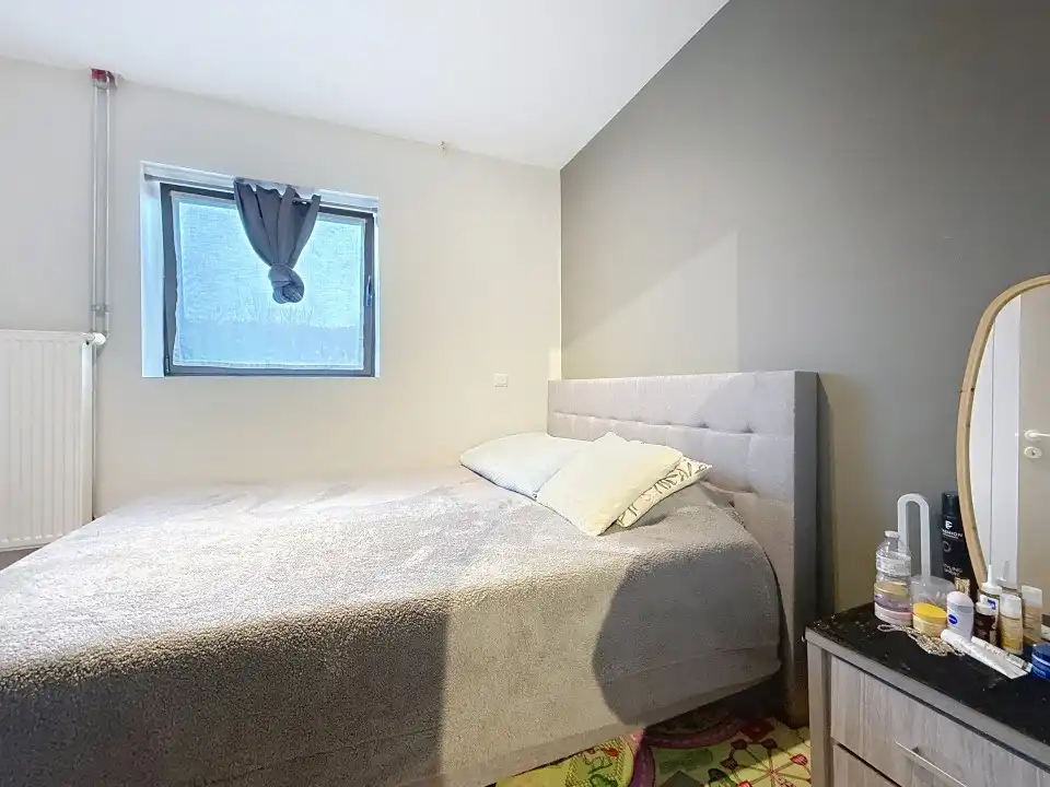 Centraal gelegen gelijkvloers appartement met tuin en garage foto 6
