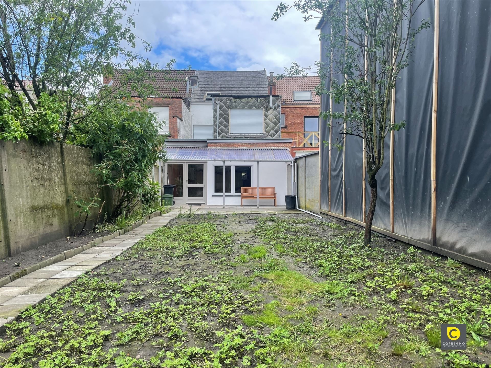 Gelijkvloers app. met ruime tuin  foto 2