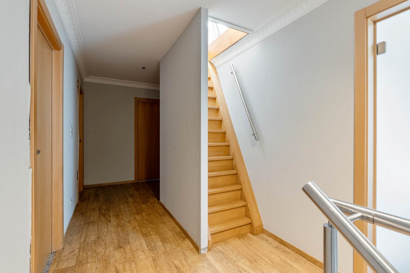 Multifunctioneel gebouw bestaande uit een woning, een winkel en een magazijn/werkplaats gelegen op een rustige locatie te Voorshoven! foto 25