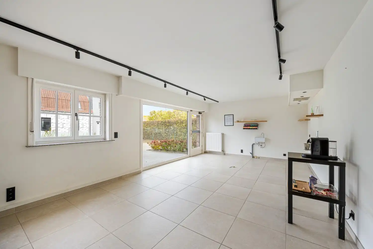 Veelzijdig (handels)huis met atelier, magazijn en zalige tuin op 1.400 m² te Meldert foto 6