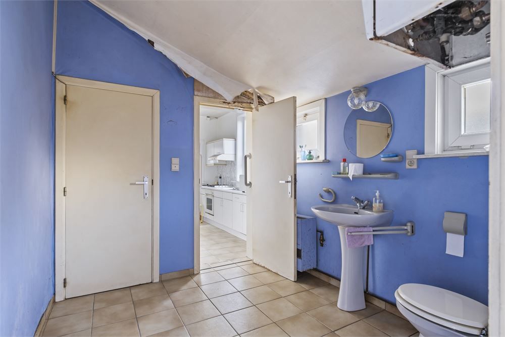 Op te frissen herenwoning met tal van mogelijkheden! foto 8
