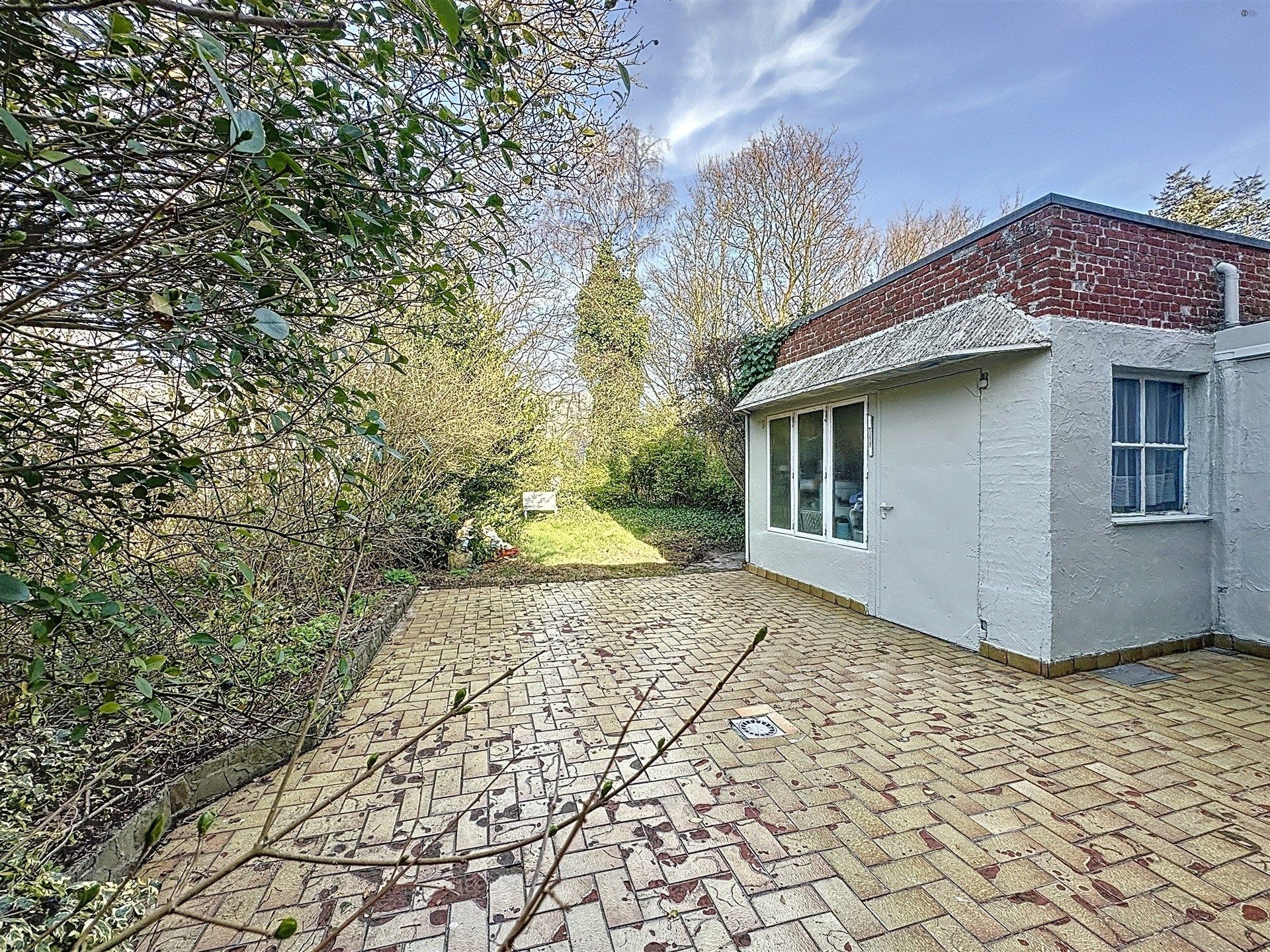 Halfopen bebouwing met 3 slaapkamers, ruime garage en leuke tuin op toplocatie! foto 14