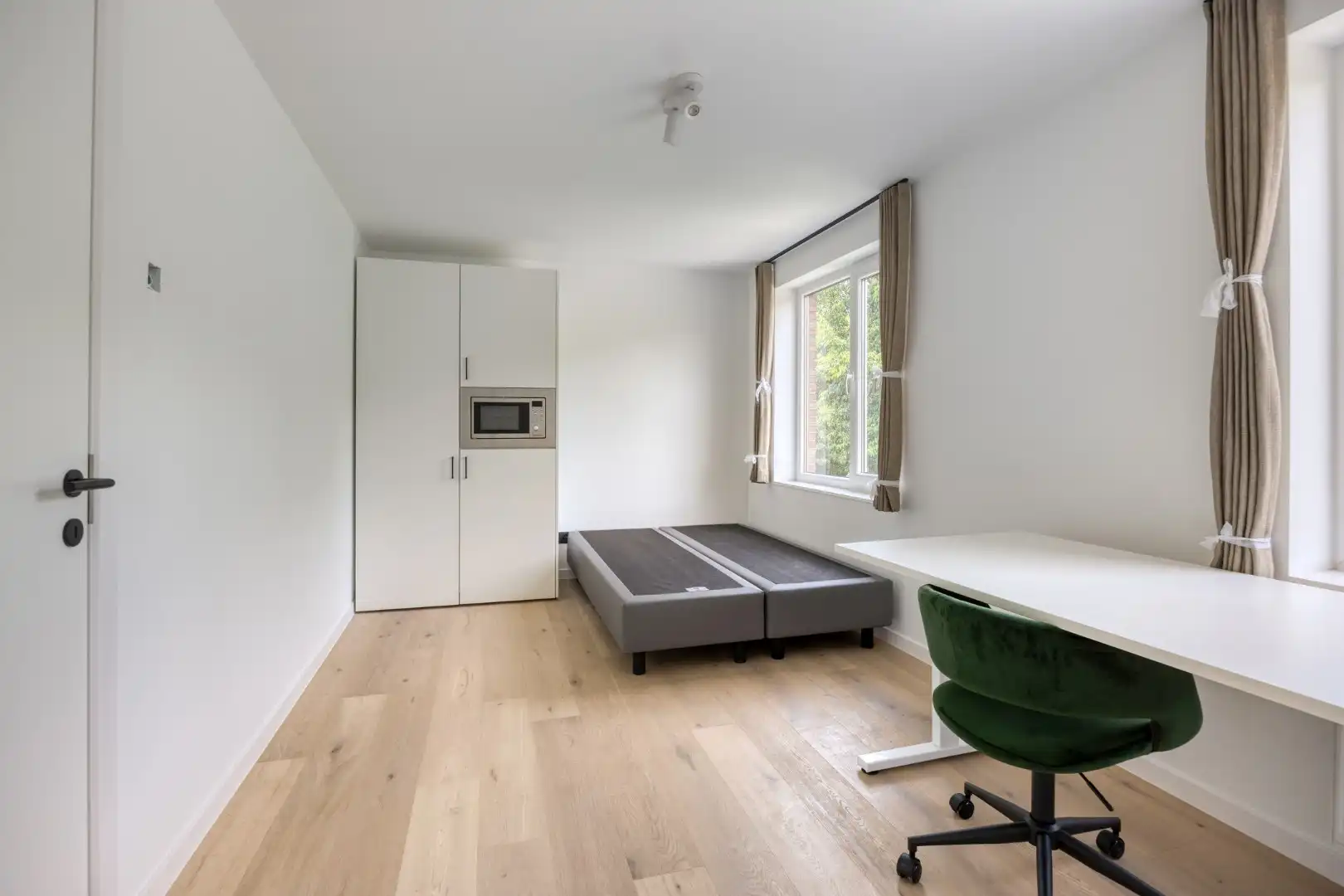 Volledig gerenoveerde studentenkamer in residentie met 29 studentenkamers met eigen sanitair en terras in hartje Leuven - EPC label A! foto 9