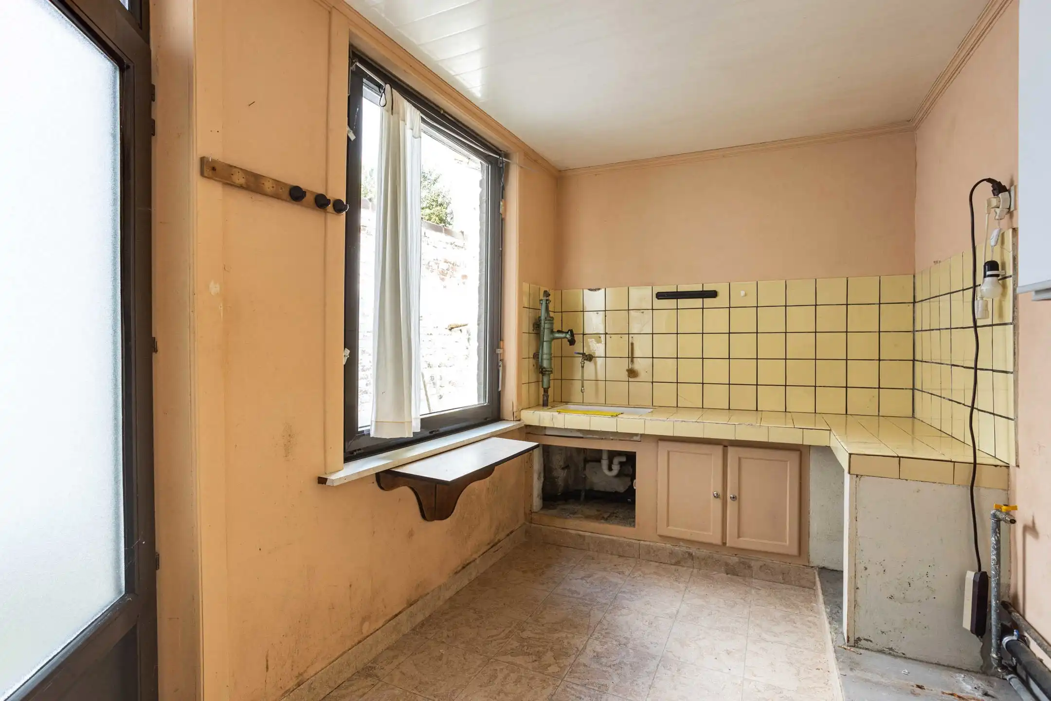 Te renoveren woning met tuin en tal van mogelijkheden foto 10
