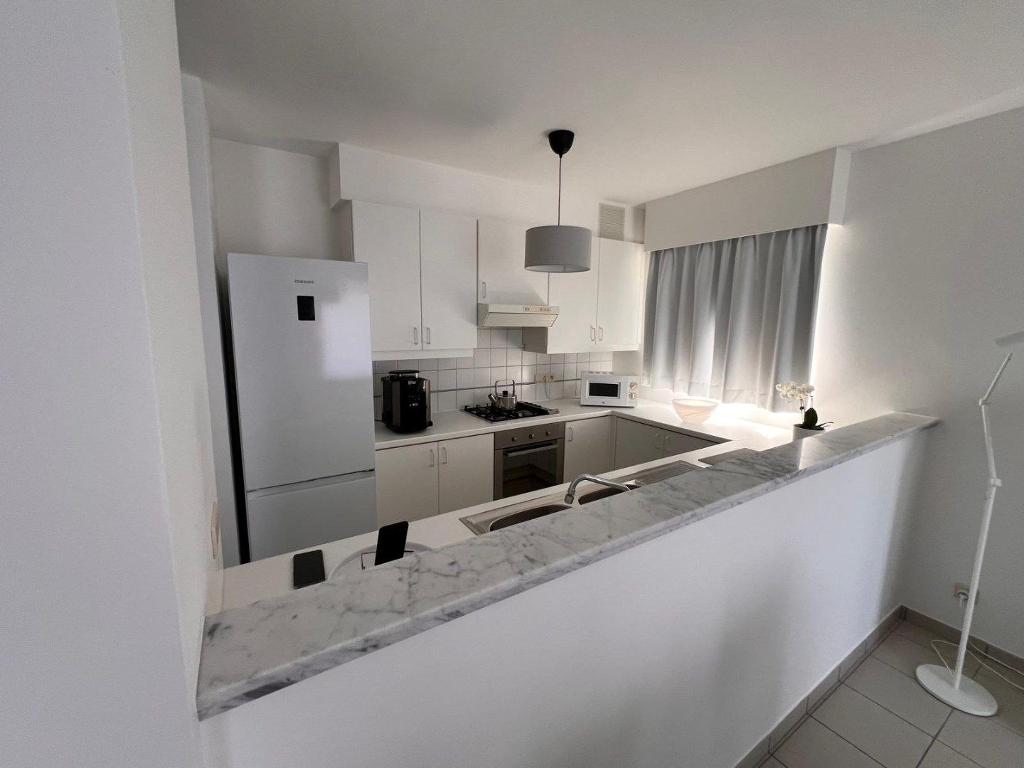 Centraal gelegen appartement met 2 slaapkamers foto 3