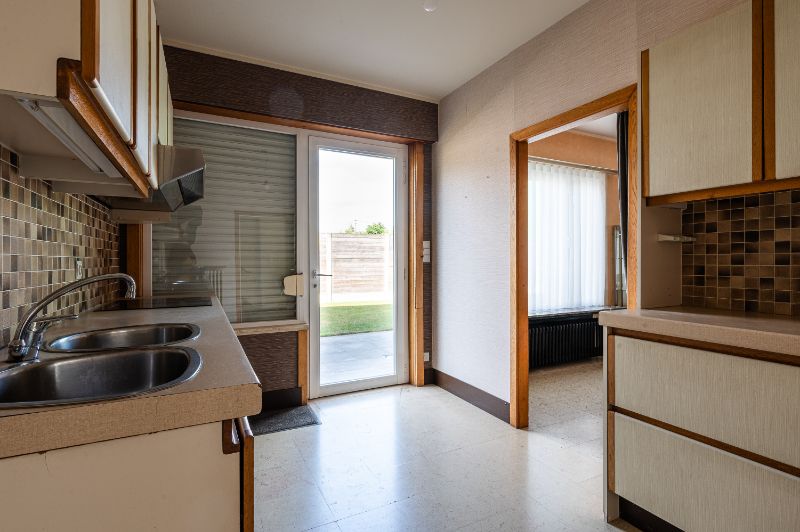 Zeer degelijke woning met veel potentieel foto 13
