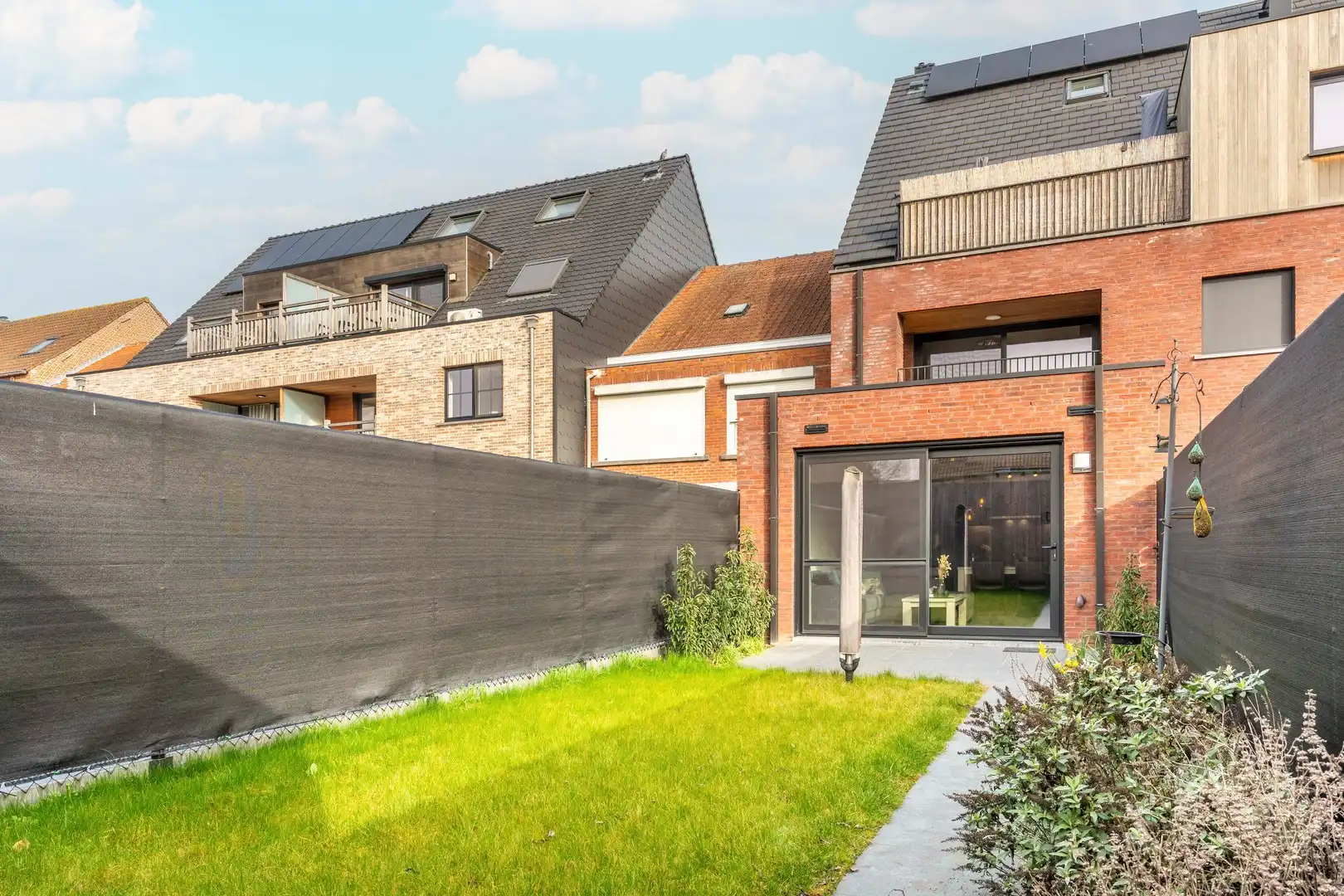 Gelijkvloers appartement met tuin en garagebox. foto 24