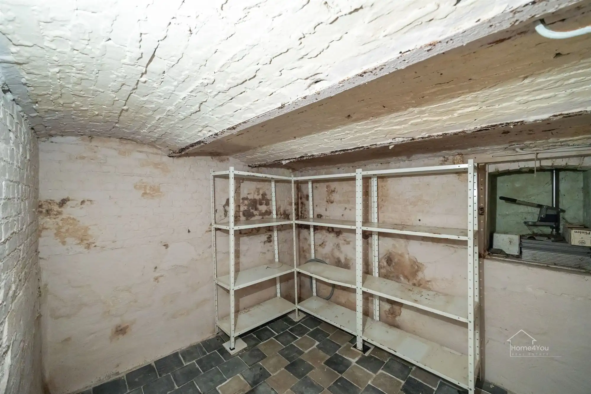 Te renoveren rijwoning met tuintje foto 12