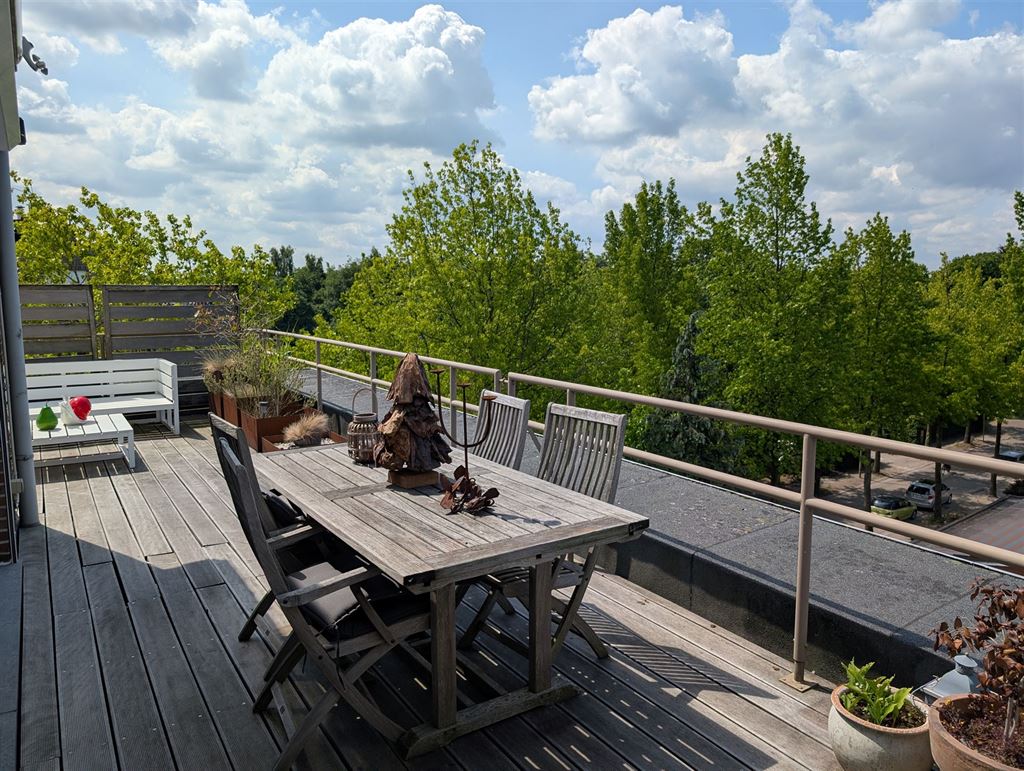 Dakappartement met rondomrond terrassen foto 13