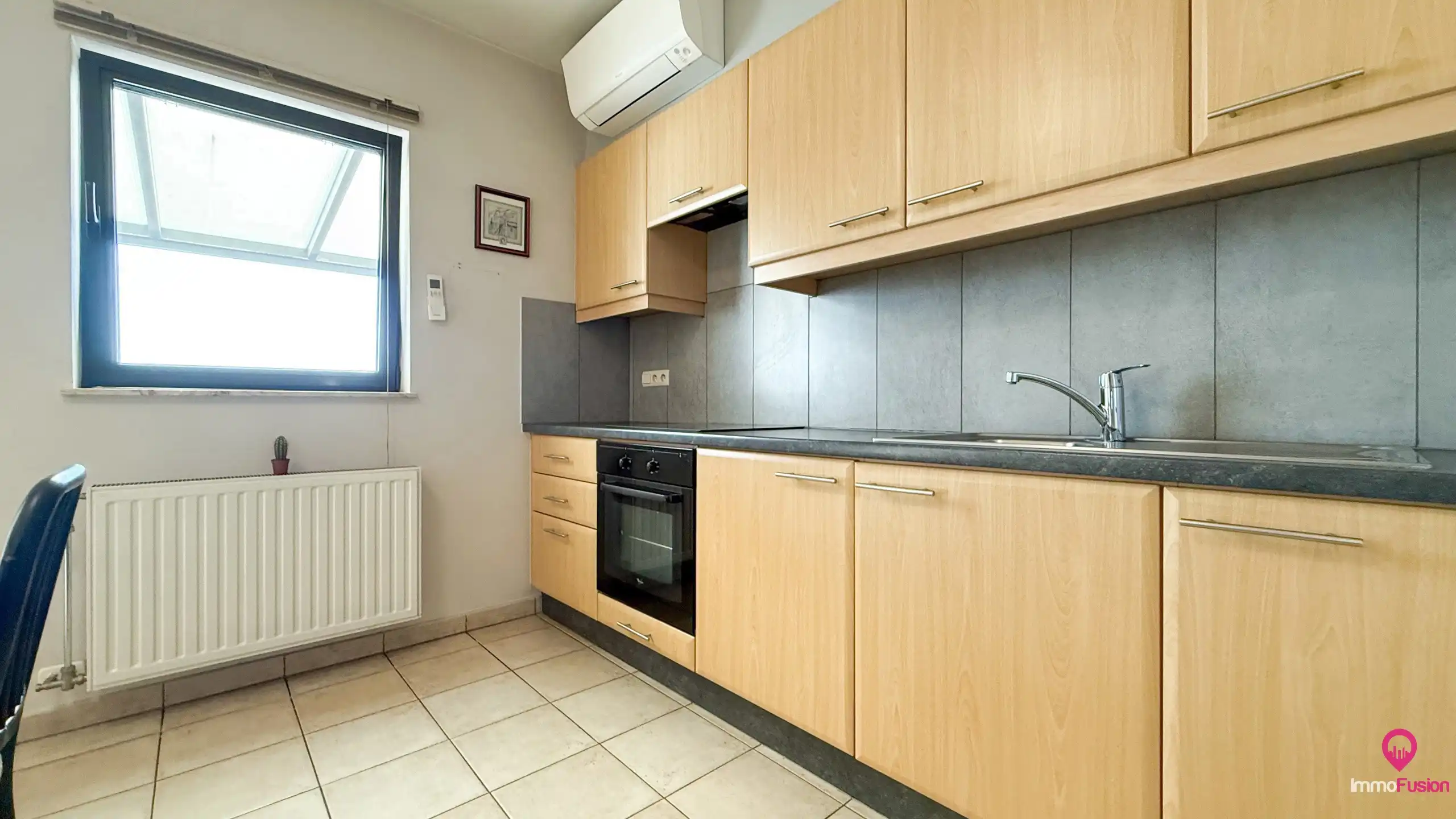 Instapklaar appartement met terras op centrale ligging! foto 12