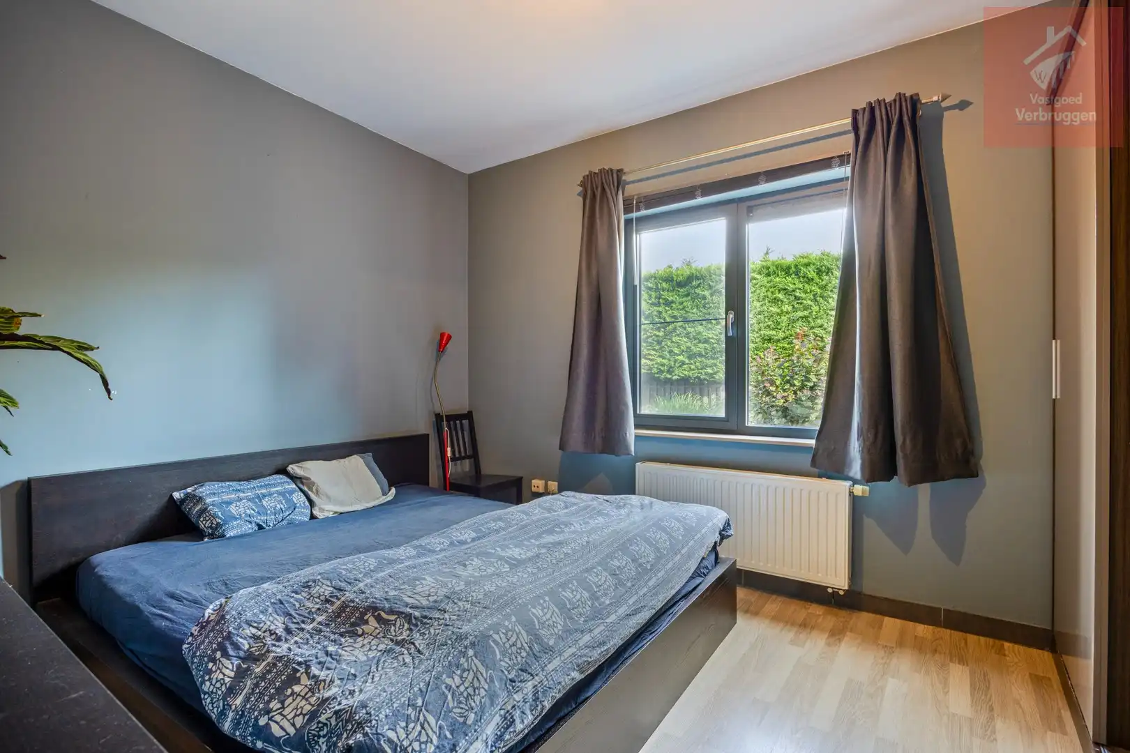 Modern instapklaar gelijkvloers appartement met 2 slpk, terrassen en autostaanplaats foto 9