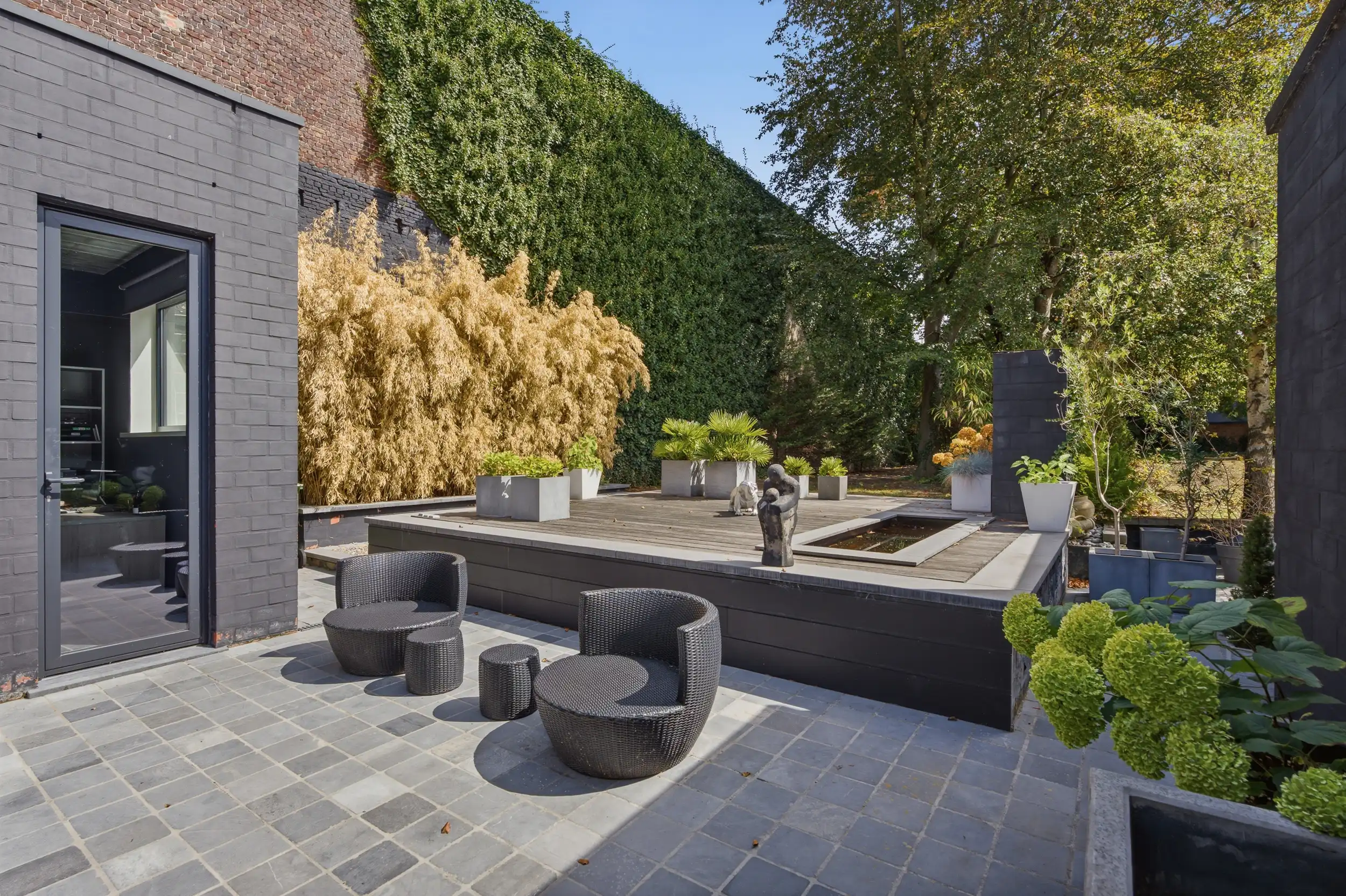 Uniek handelspand met duplex app. en tuin in hartje Wetteren foto 22