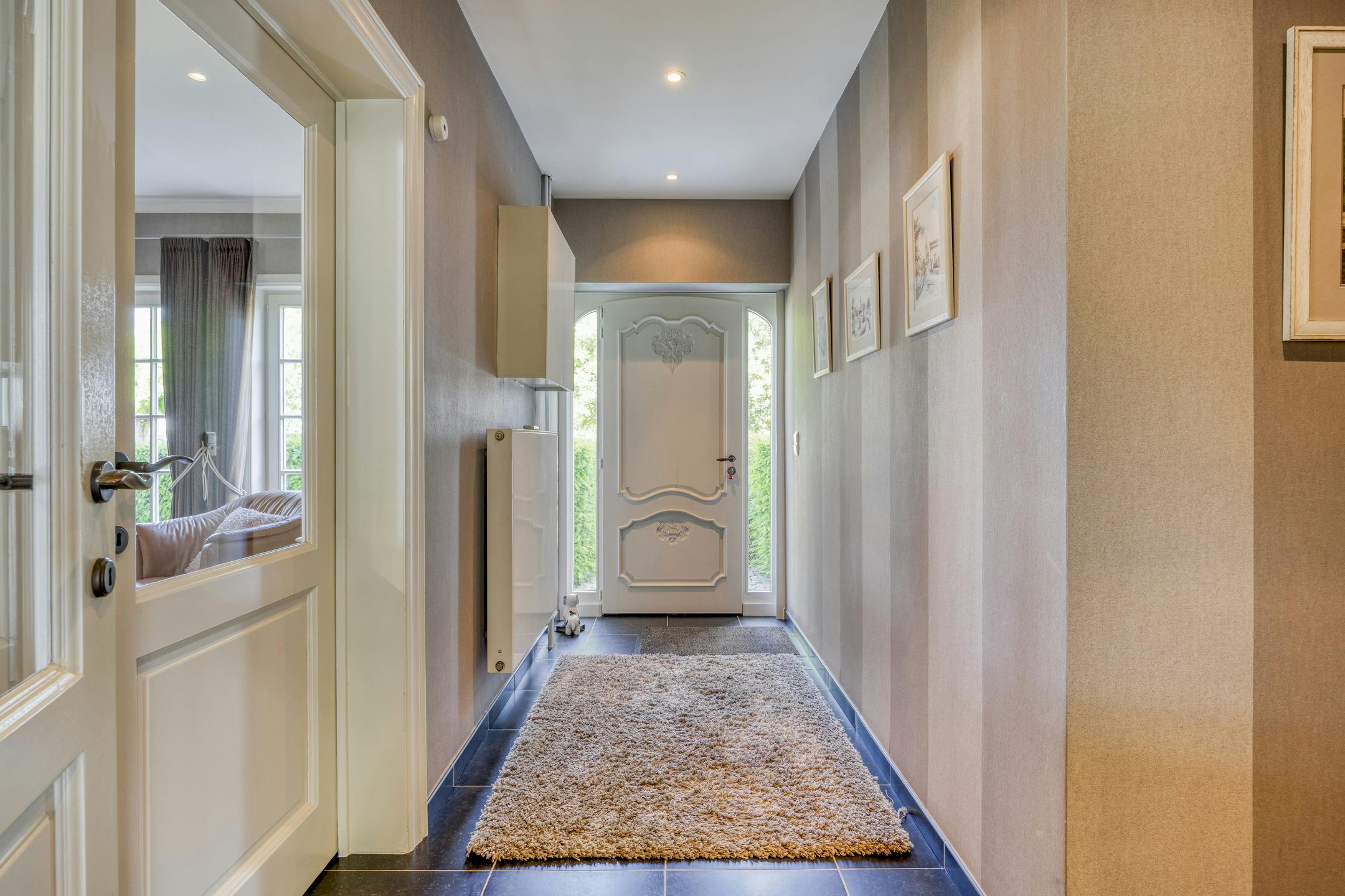 Riante zorgwoning/kangoeroewoning met loods te koop foto 3