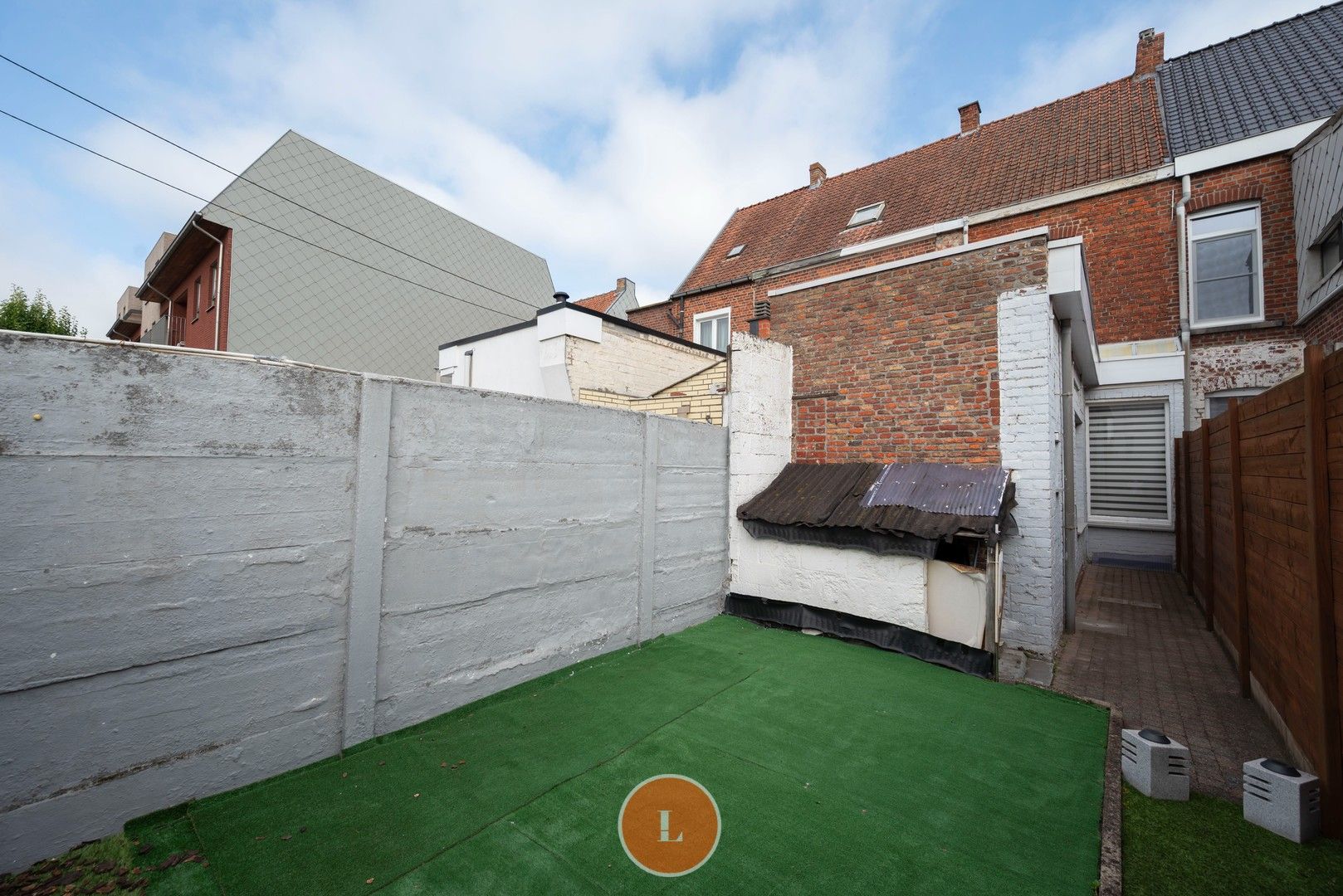 Te renoveren woning te koop in centrum Menen foto 13
