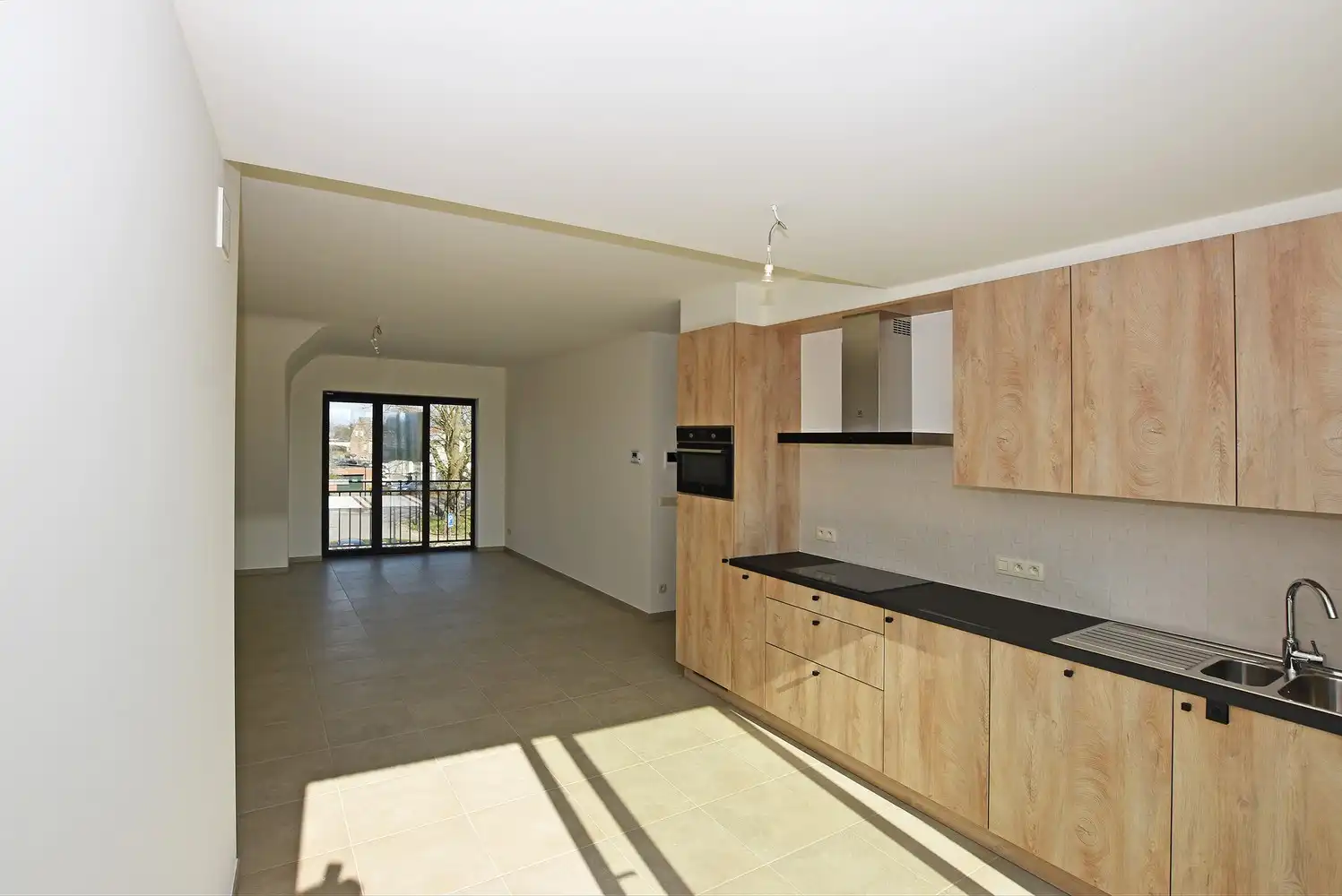 Nieuwbouwappartement met één slaapkamer en een ruim Z-terras te Broechem! foto 3