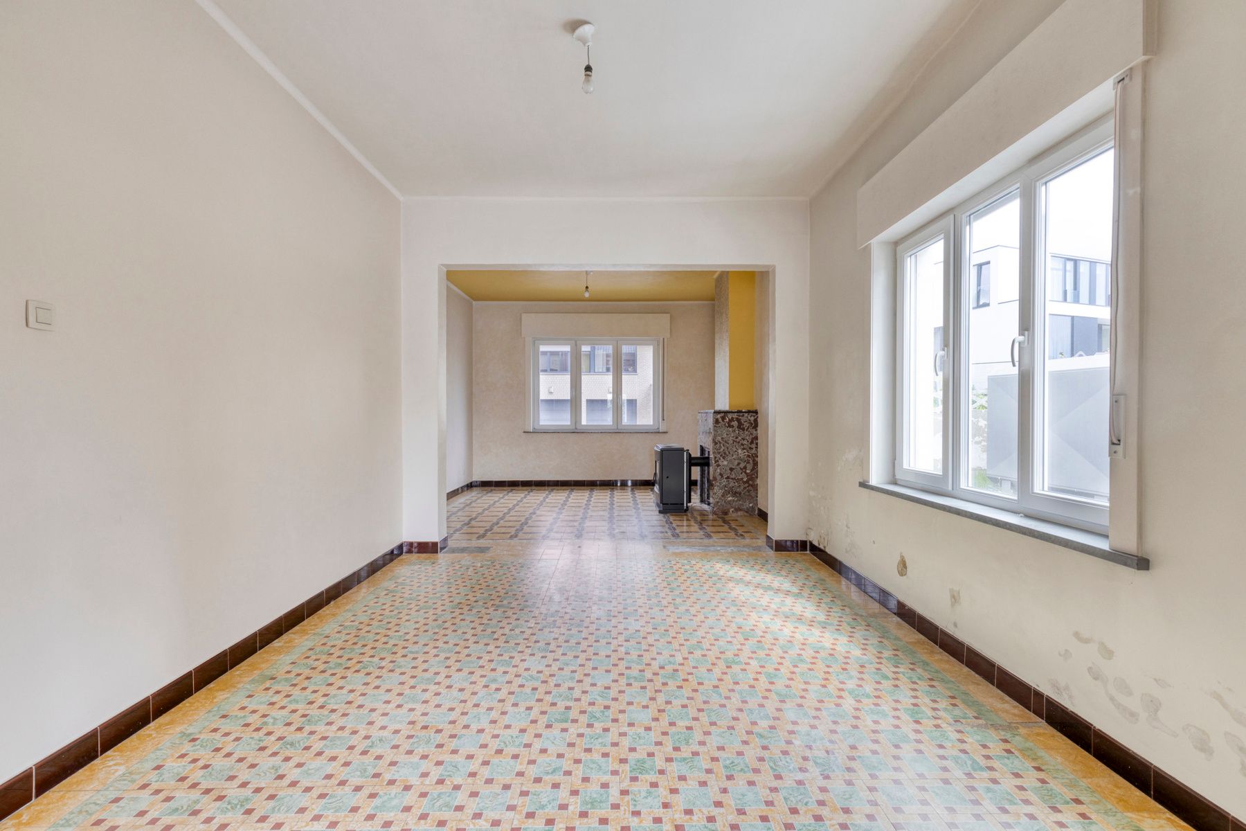 Deels te renoveren lichtrijke driegevelwoning  foto 7