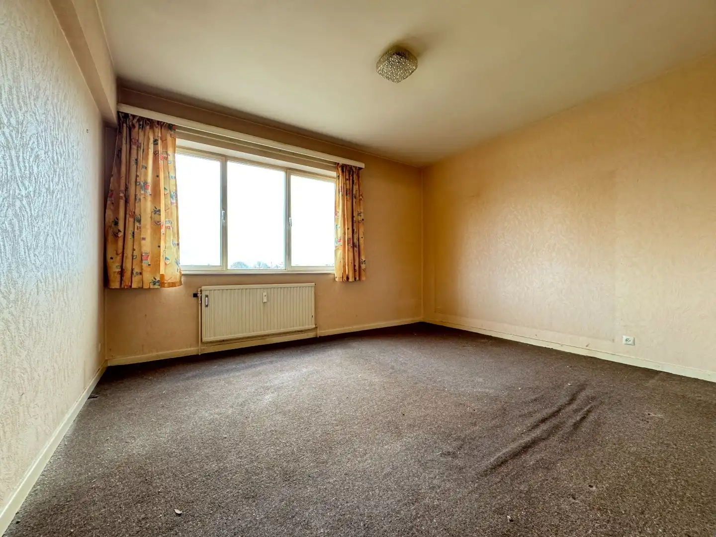 Een lichtrijk 2-SLPK.-appartement met kelder foto 11