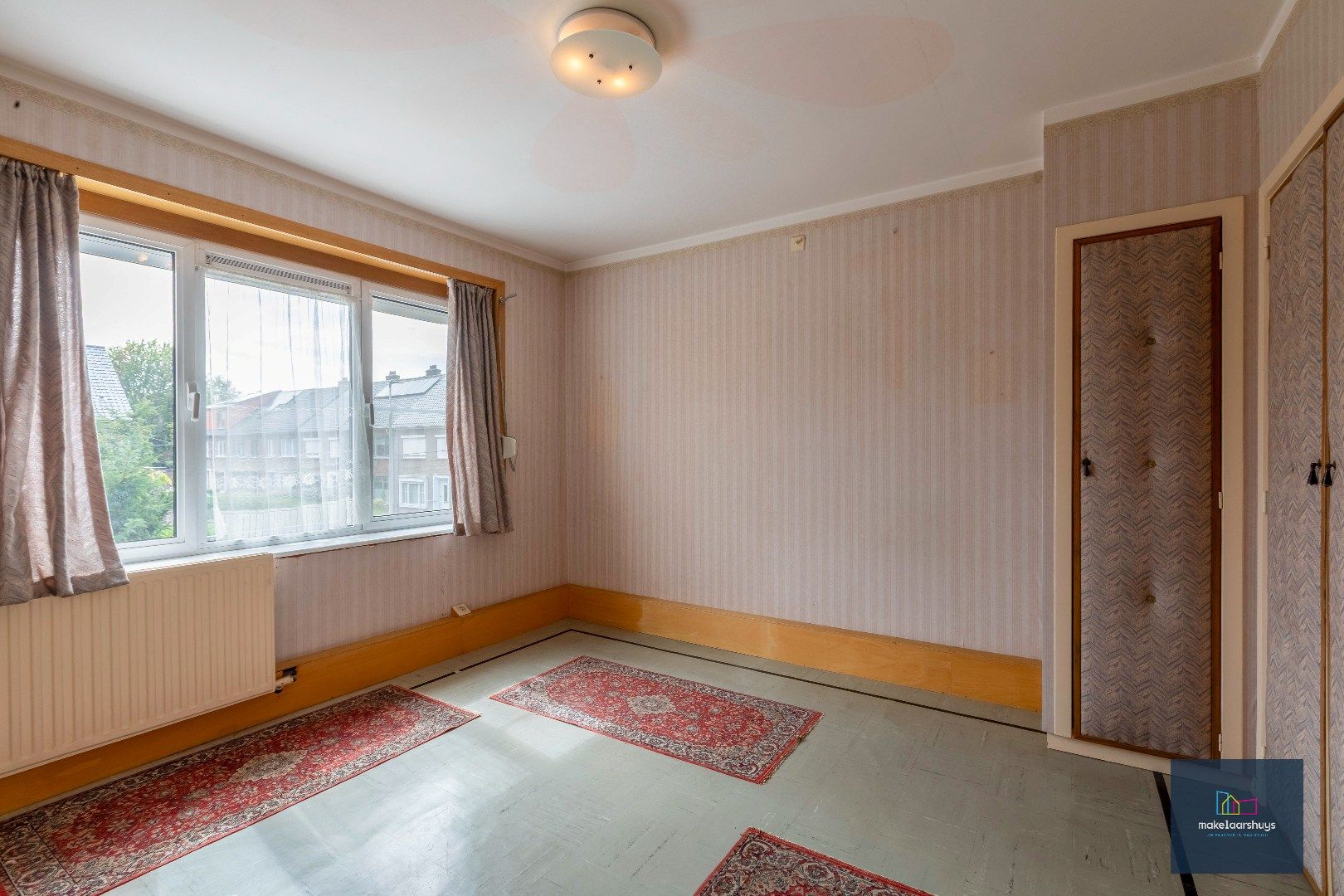 Gunstig gelegen woning met tuin en garage foto 13