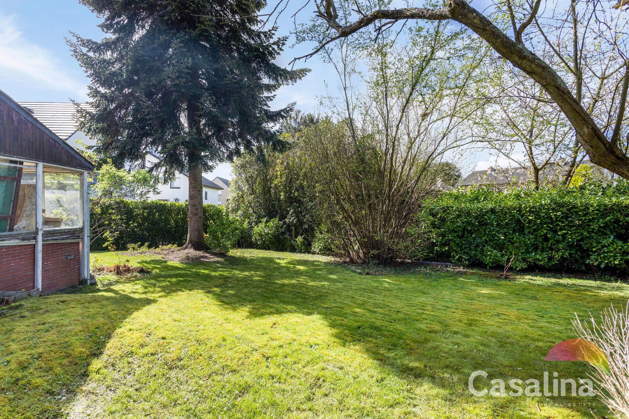 Viergevelwoning van 209m² met tuin foto 30