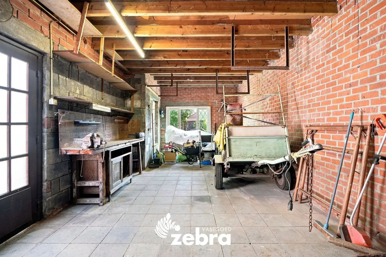 Halfopen woning in tuinwijk te koop in Roeselare! foto 12