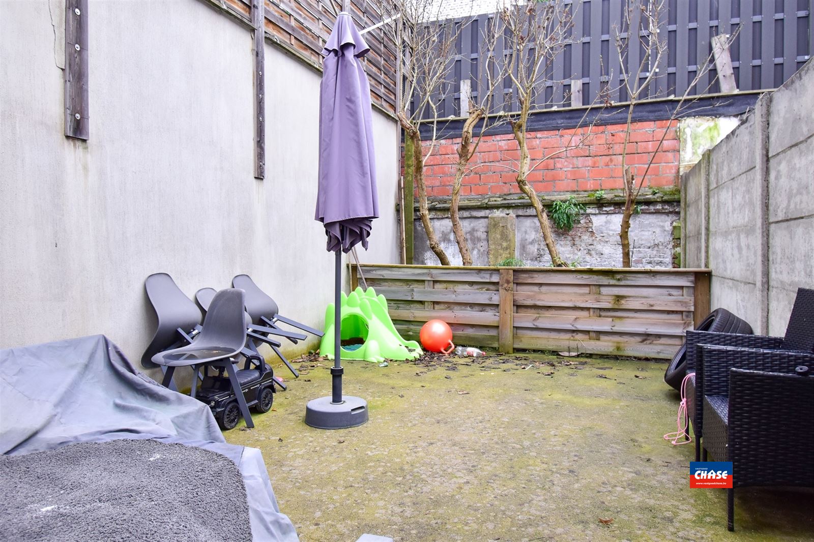 Handelshuis ingedeeld als kapperszaak, studio mret tuin en duplex app met 2 slpks en terras foto 14