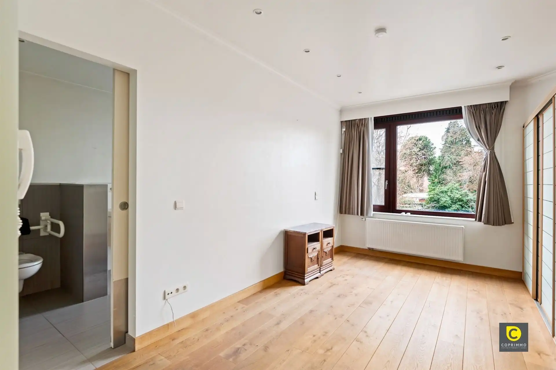 Woning met gezellige tuin en garage op centrale ligging! foto 5