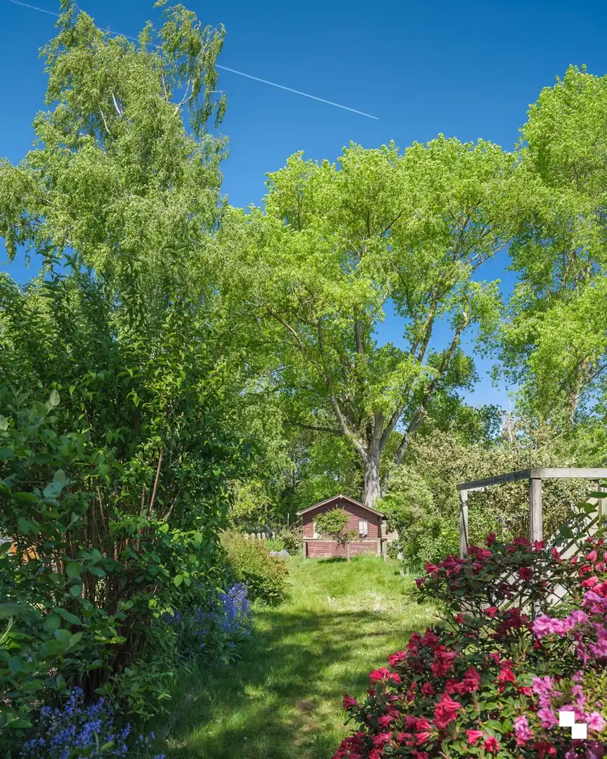 Te renoveren woning met gezellige tuin in het hart van Merelbeke foto 23