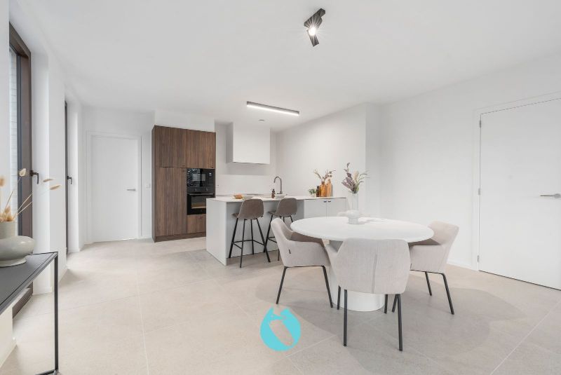 Green Square presenteert u 35 nieuwbouwappartementen en een winkelpand, letterlijk ónder de Kerktoren van Sleidinge. foto 3