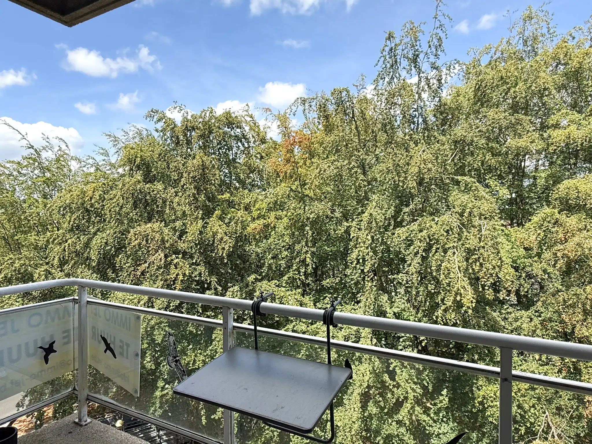 Appartement met twee slaapkamers, twee terrassen en garage in het hartje van Beveren foto 4