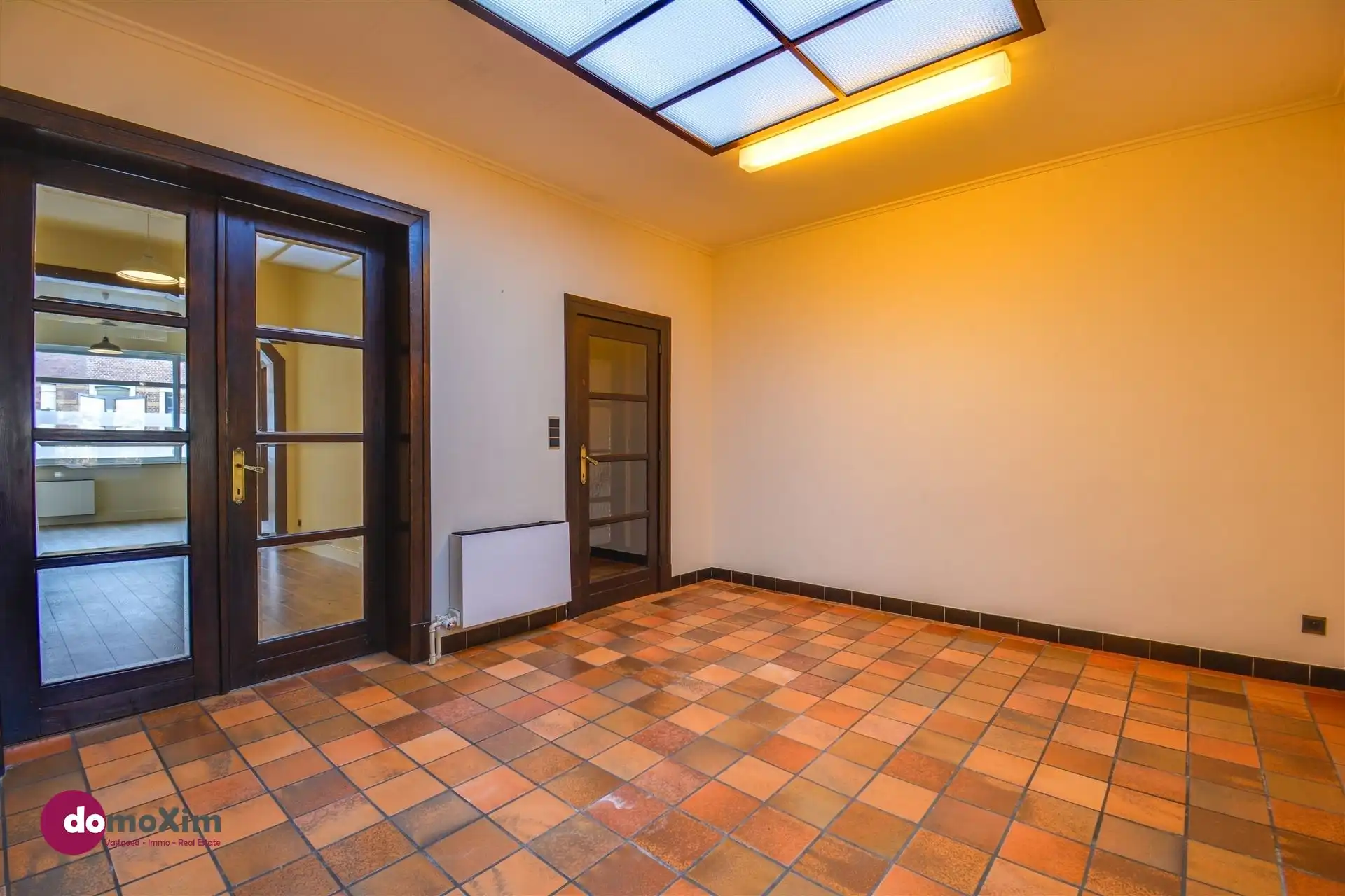 Ruime, karaktervolle stadswoning met twee garageboxen en tuin in Mechelen foto 8