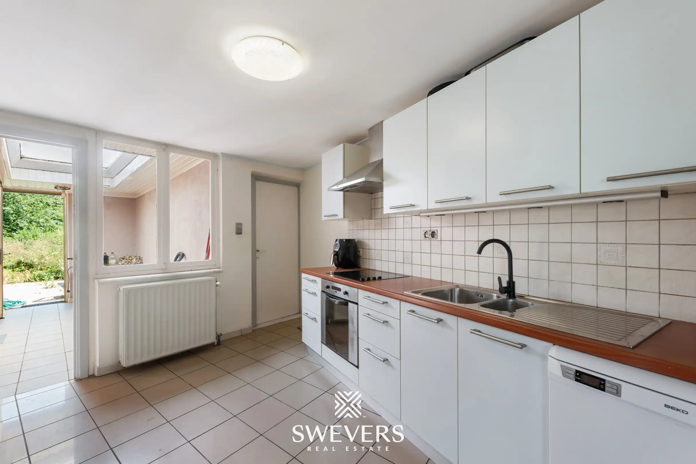 Ruime renovatiewoning met 4 slaapkamers op centrale ligging in Riemst foto 14