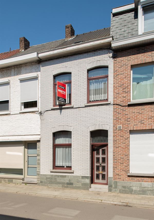 Een eengezinswoning met 3 slaapkamers en tuin, gelegen in het stadscentrum foto 1