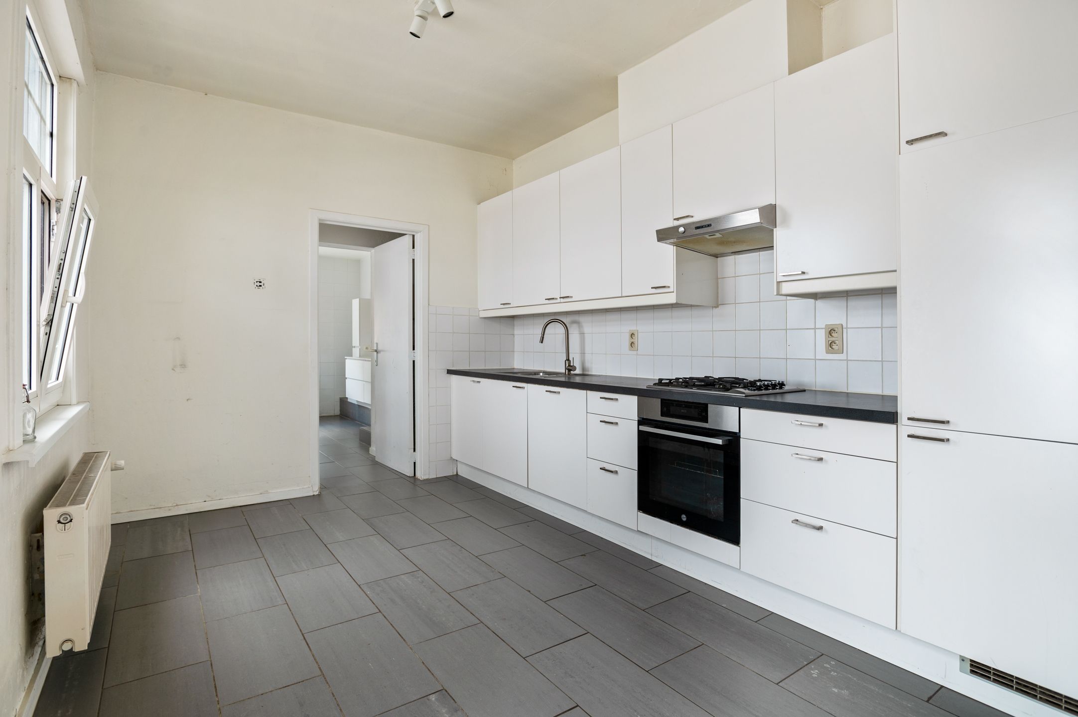 Halfopen woning met 2 slaapkamers en een grote tuin in Brasschaat te huur! foto 10