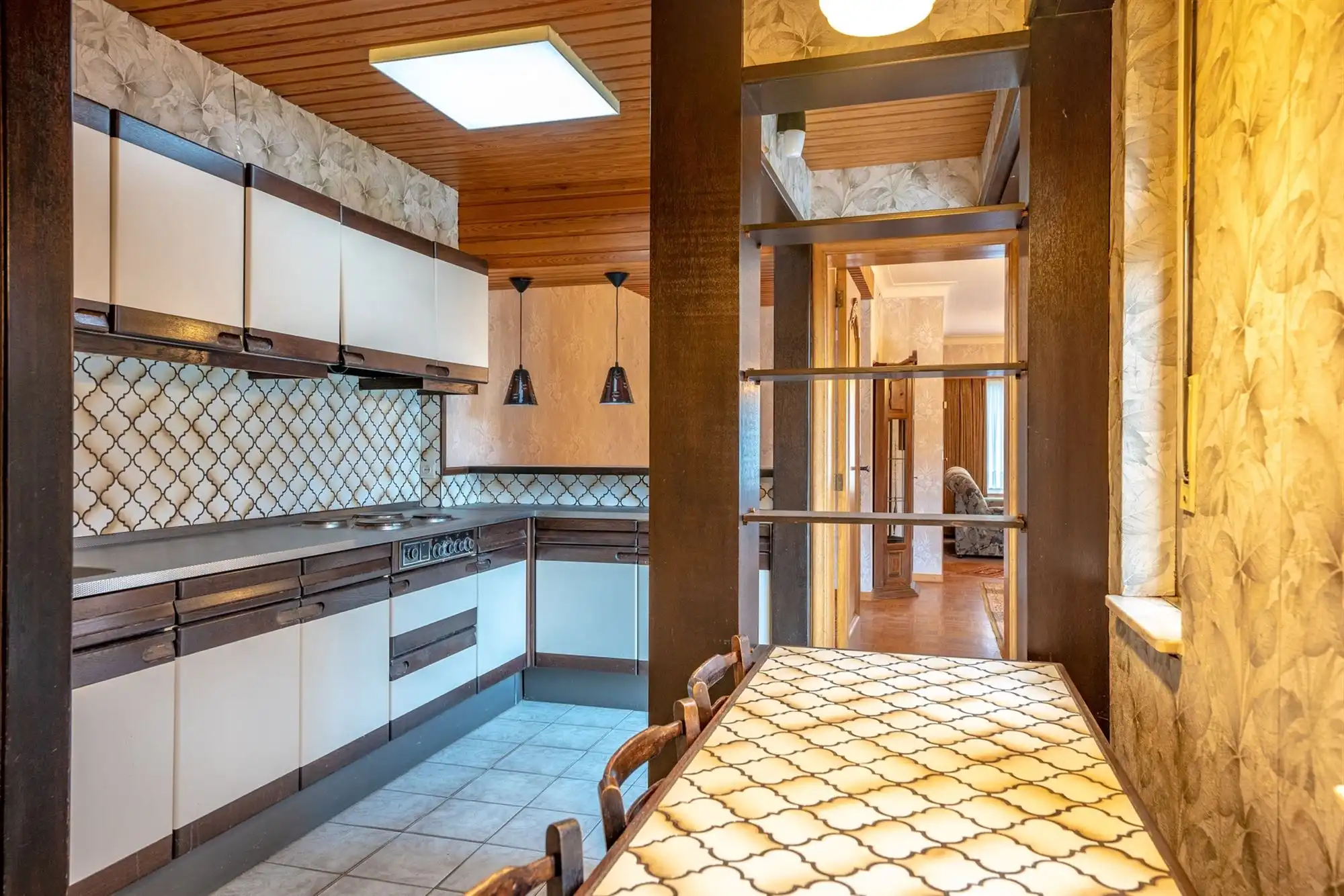 Op te frissen half-open gezinswoning met 3 slaapkamers en een ruime zolder foto 6