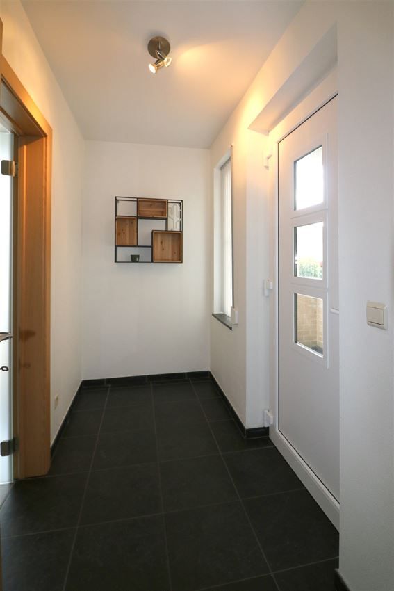 Duplex met groot terras, twee slpk en afgesloten garage foto 5