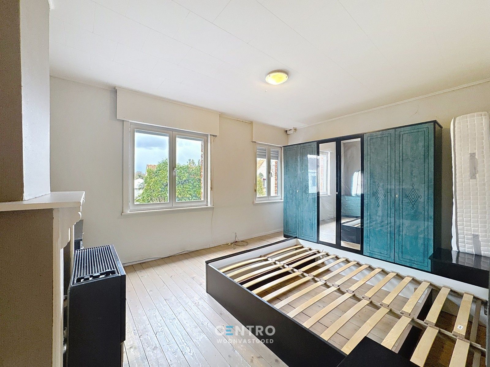 Op te frissen woning met 4 slpks én ZUIDger. tuin te Assebroek! foto 11