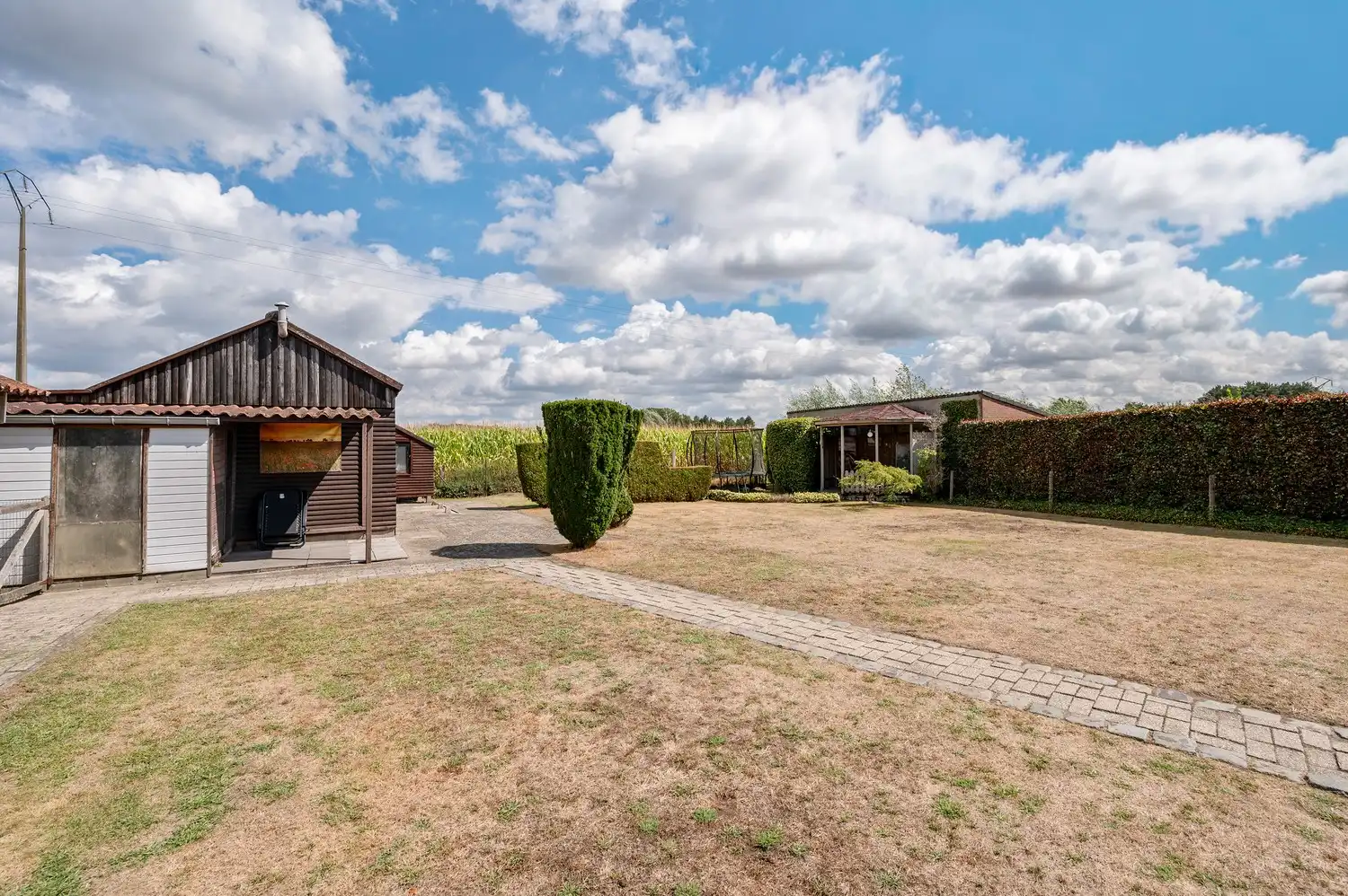 Instapklare open bebouwing op een ruim perceel van 1.185 m², landelijk gelegen met een prachtig vrij uitzicht aan de achterzijde. foto 40