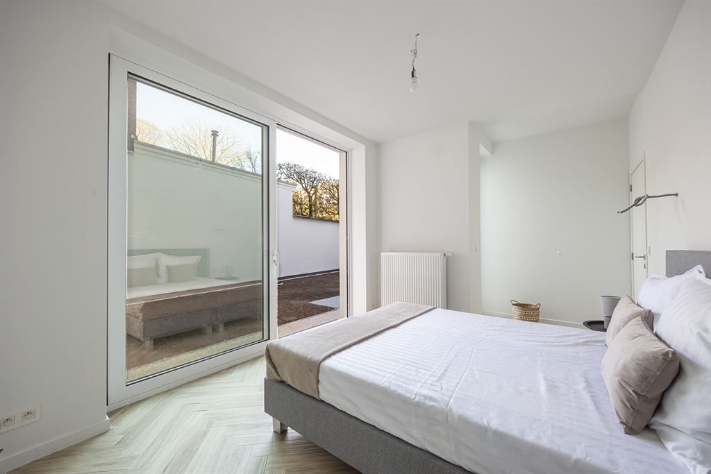 Stijlvol gerenoveerd gelijkvloers appartement foto 13
