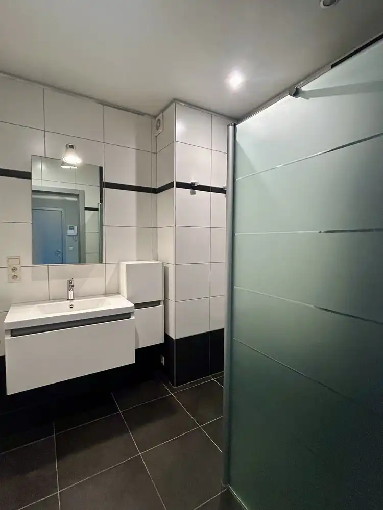 Modern appartement met 2 slaapkamers en garagebox te Leuven foto 11