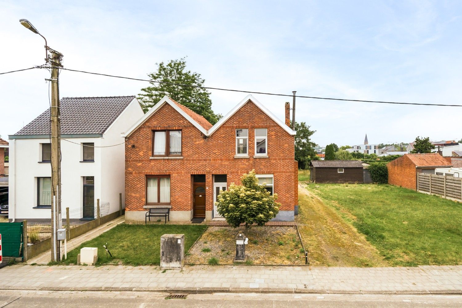 Lichtrijke woonst met 2 slaapkamers, grote tuin en mooie buitenaanleg! foto 1