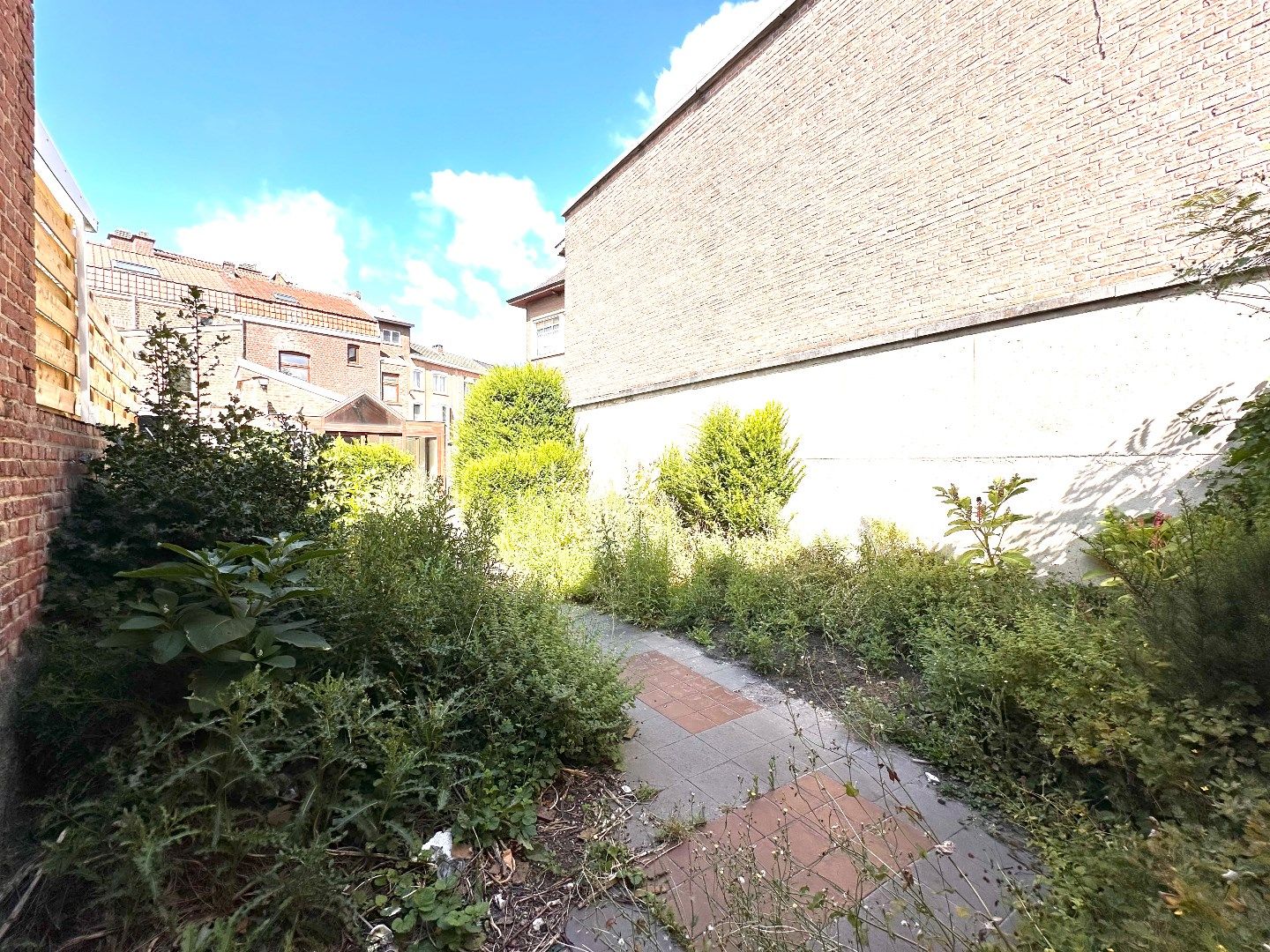 Ruime gezinswoning met 4 slaapkamers, tuin en privé parking in hartje Tongeren foto 11