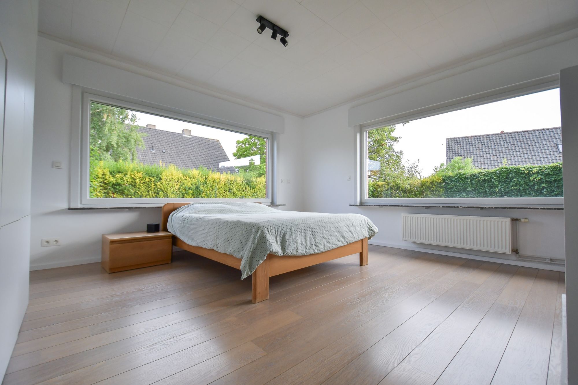 Trendy vernieuwde woning met uitbouw en grote tuin op uiterst rustige, doch centrale ligging. foto 16