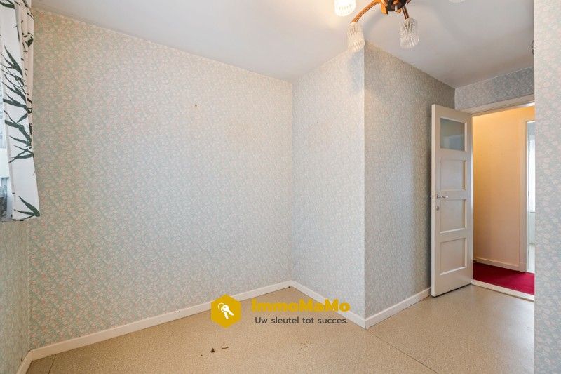 Te renoveren woonst in een rustige wijk te koop in Moerbeke foto 11