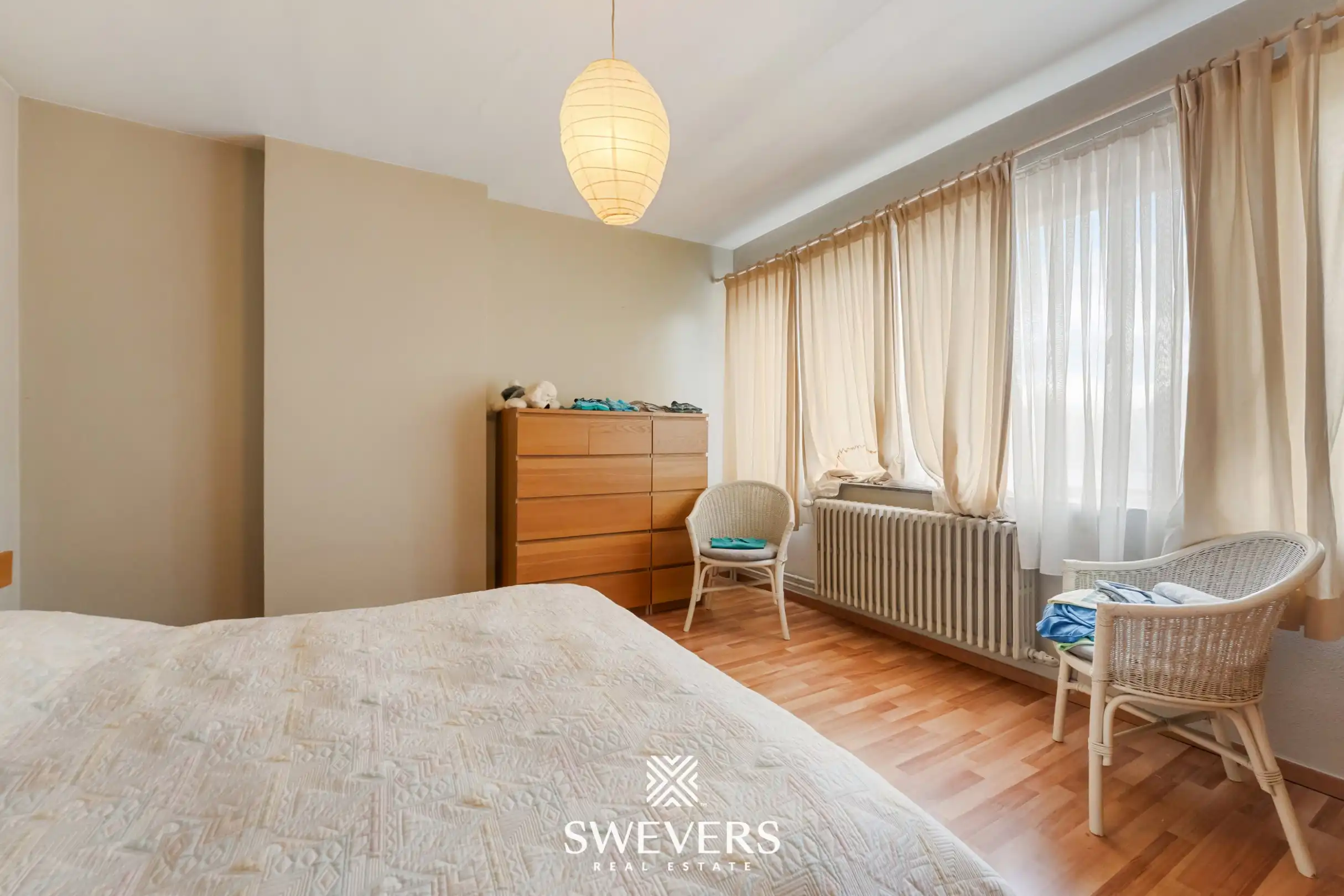 Ruime halfopen bebouwing met 4 slaapkamers en veel renovatiepotentieel op topligging in Hasselt foto 14