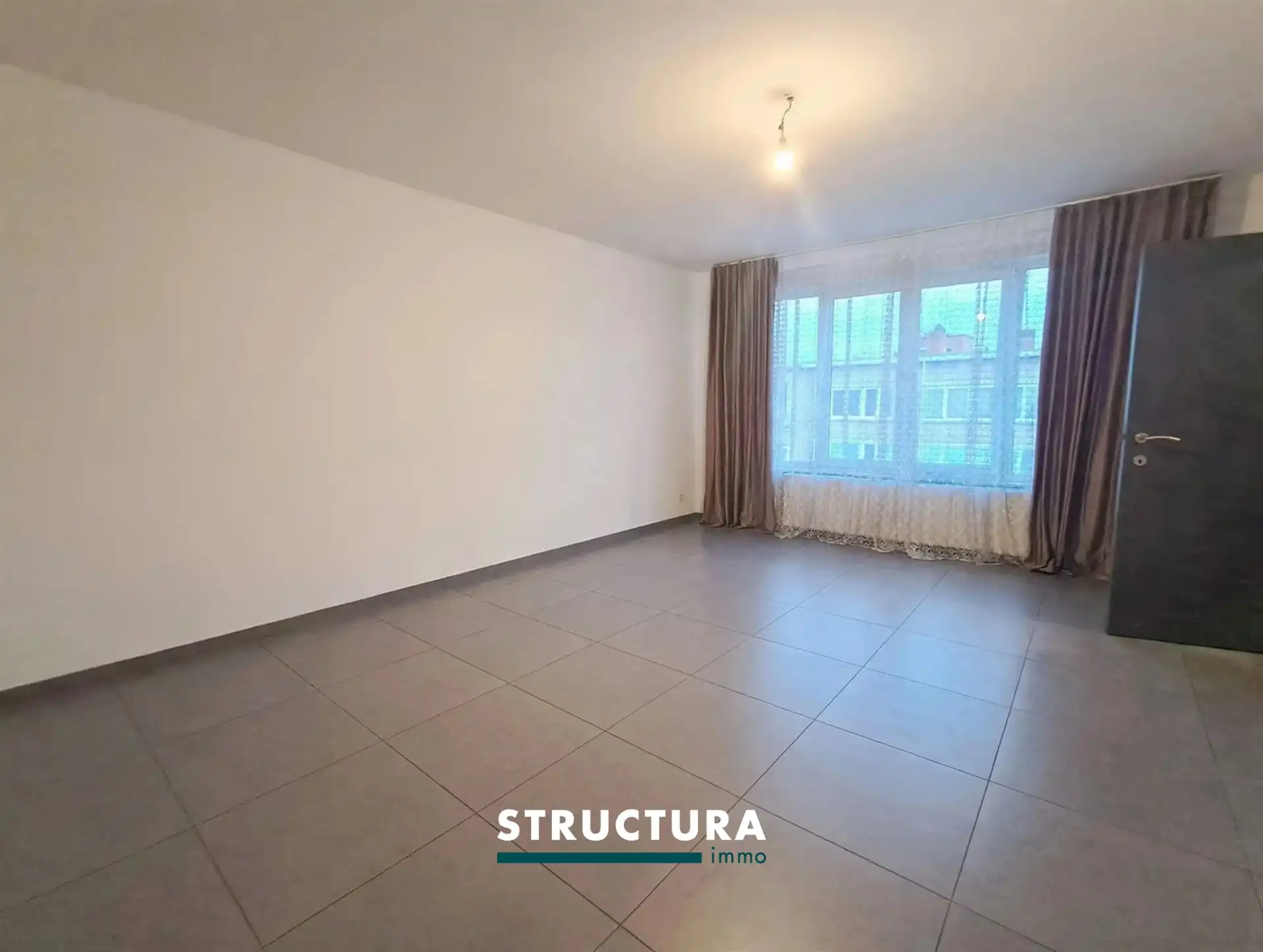Gerenoveerd appartement in centrum Strombeek-Bever foto 2